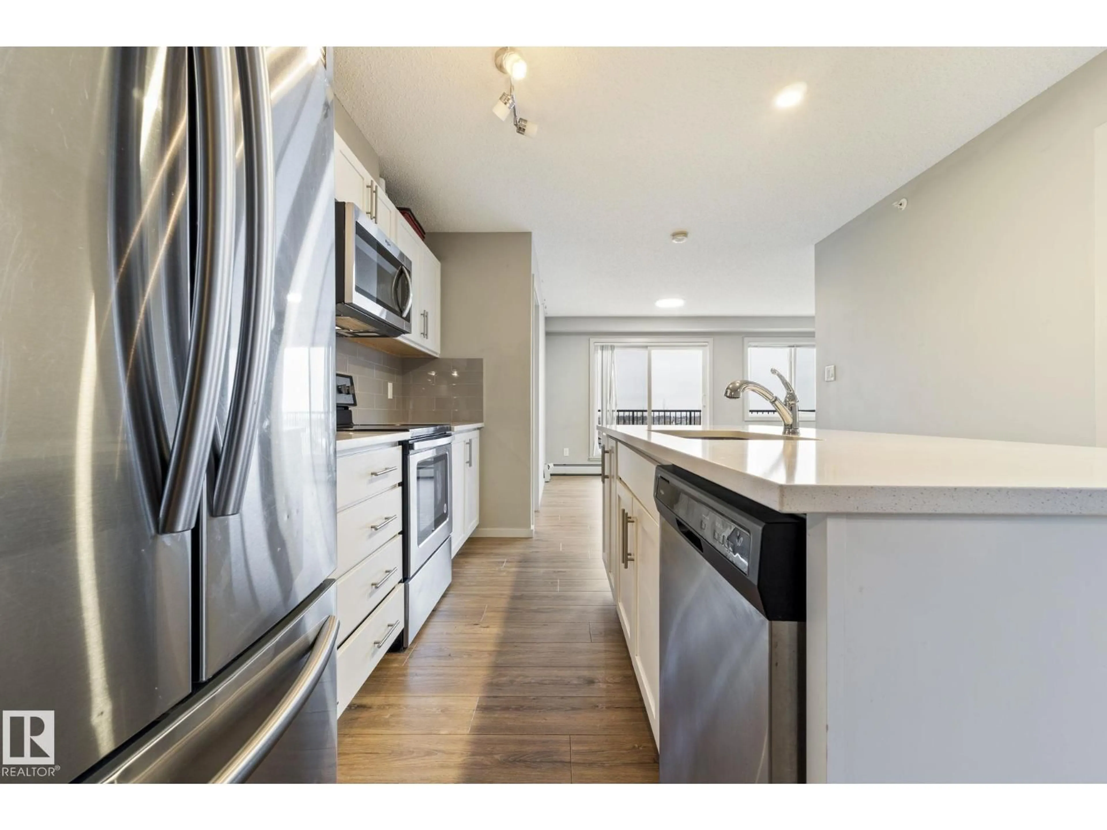 Open concept kitchen, unknown for 420 - 5404 7 AV SW, Edmonton Alberta T6X2K4
