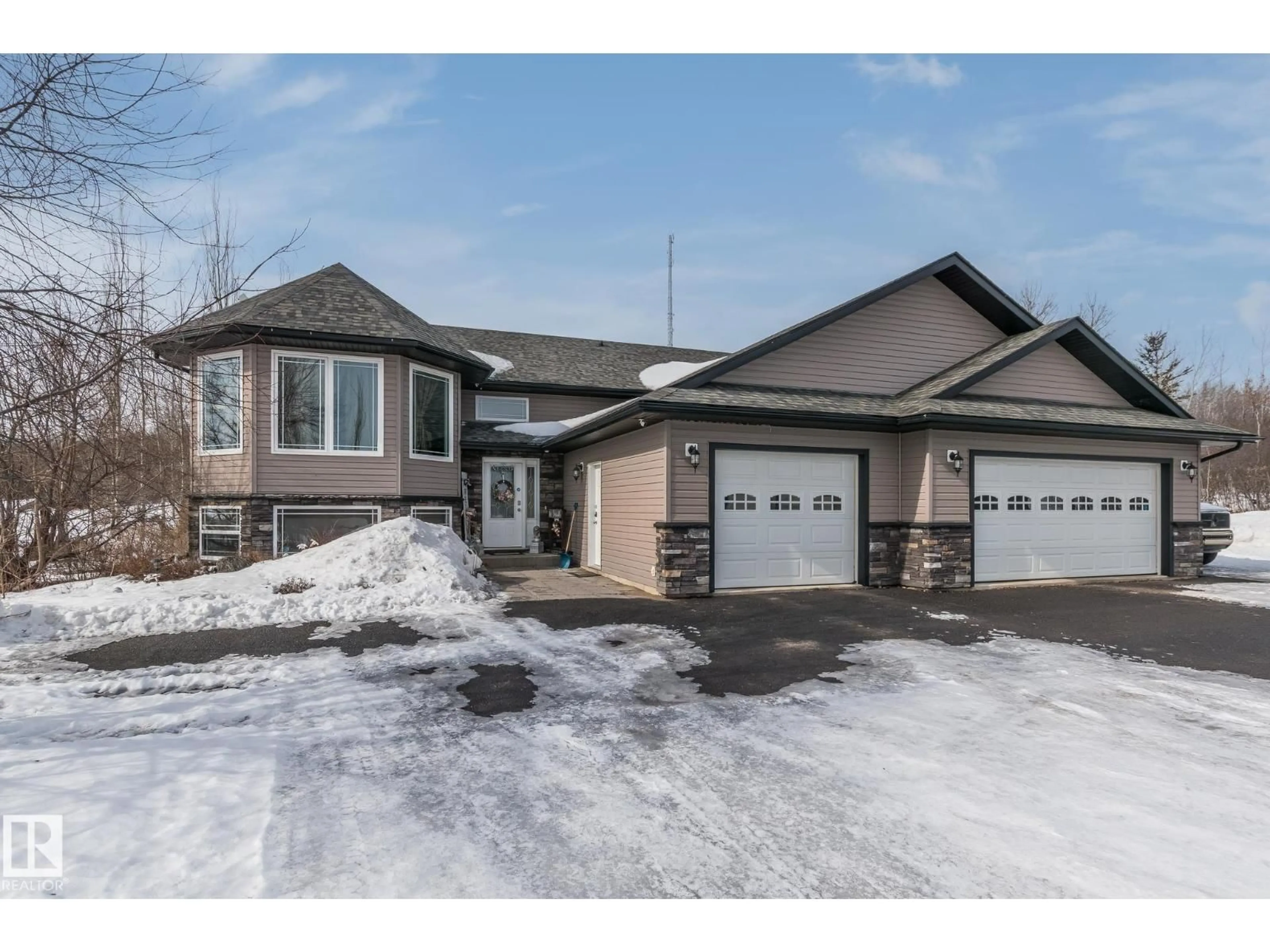 Home with brick exterior material, street for 46324 - 40 TWP RD 611, Rural Bonnyville M.D. Alberta T9N2G6