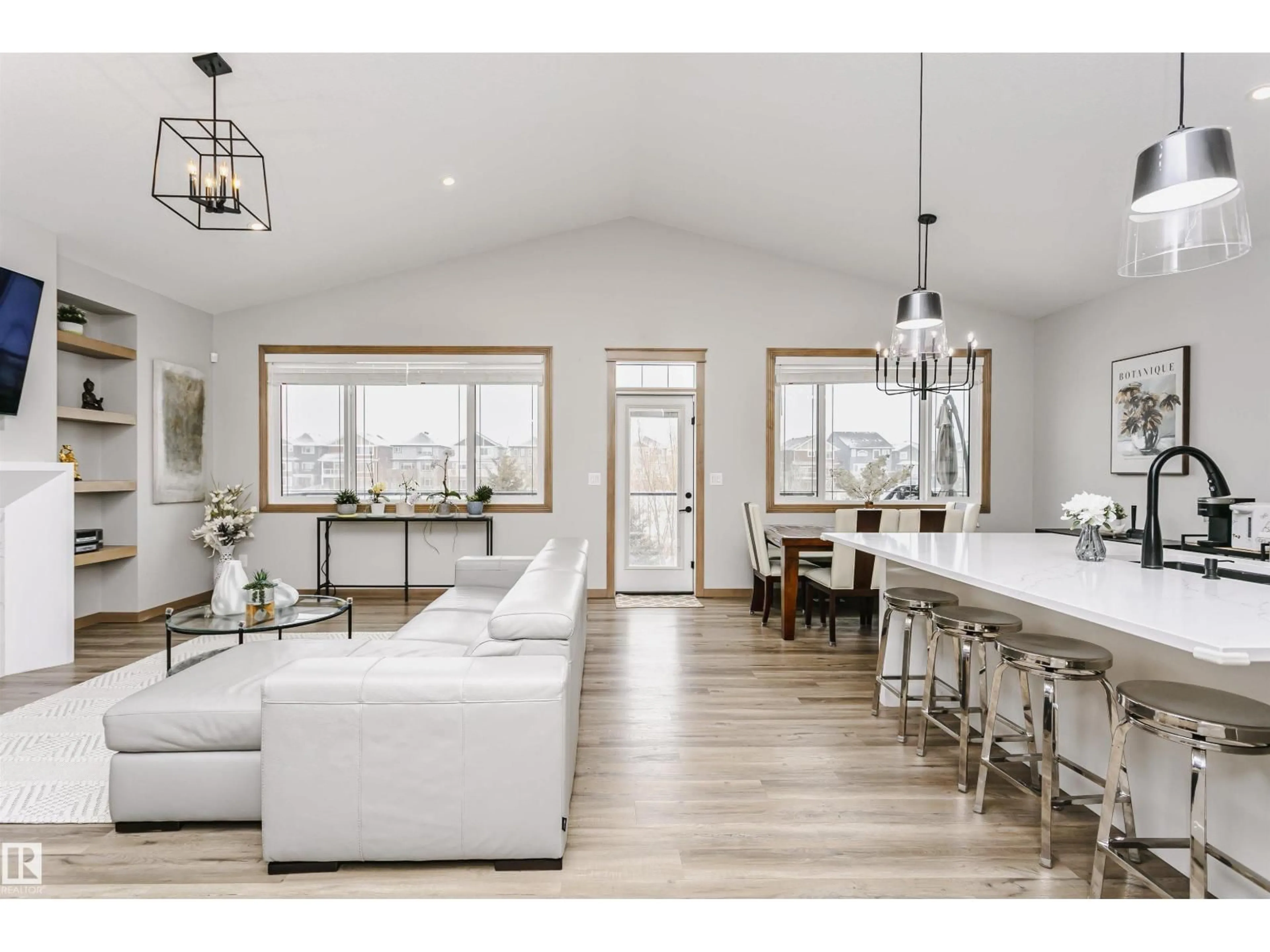 Open concept kitchen, wood/laminate floor for 9735 223 ST, Edmonton Alberta T5T7B6