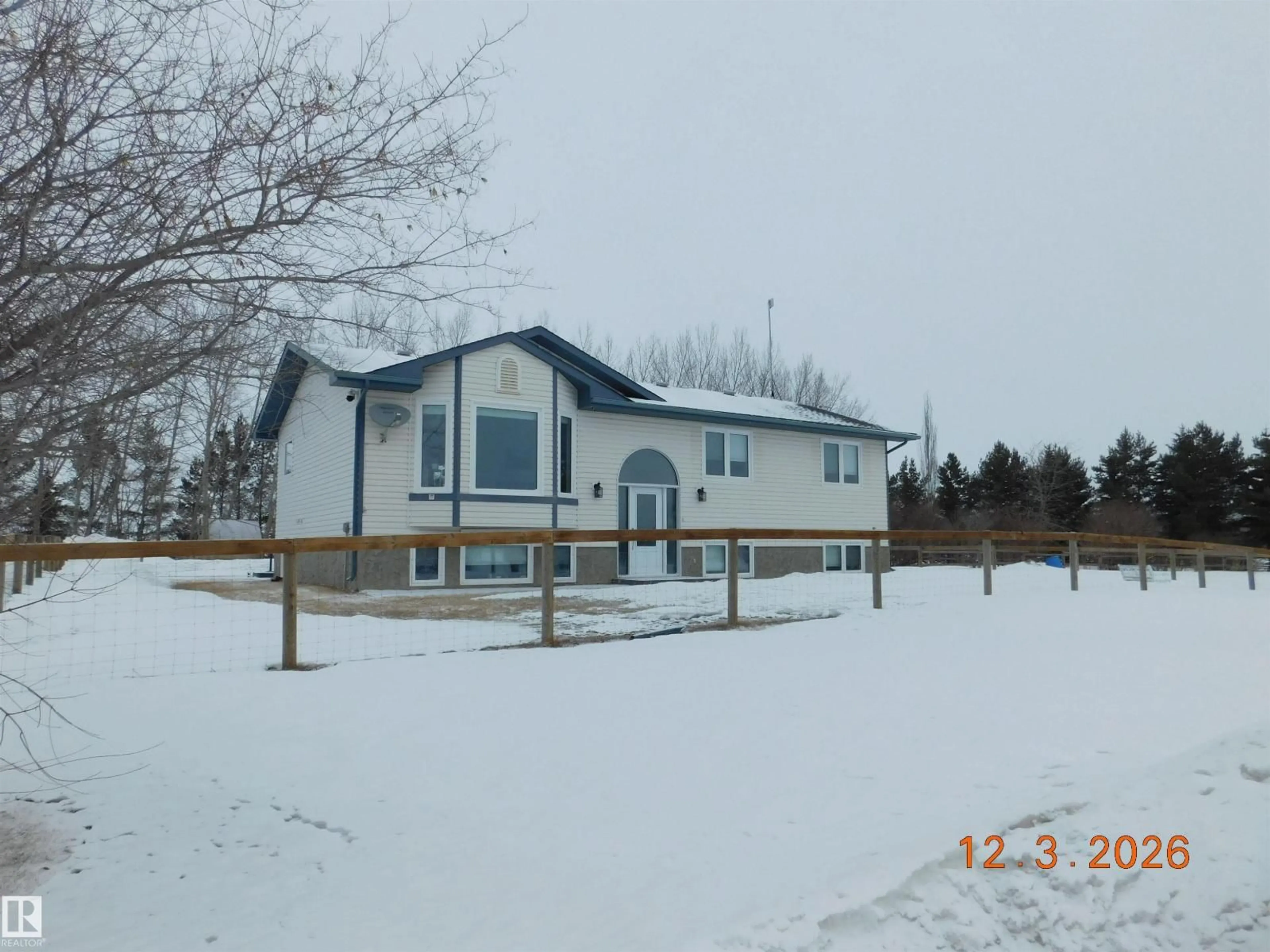 A pic from outside/outdoor area/front of a property/back of a property/a pic from drone, unknown for 26006 TWP ROAD 554, Rural Sturgeon County Alberta T8R2G9