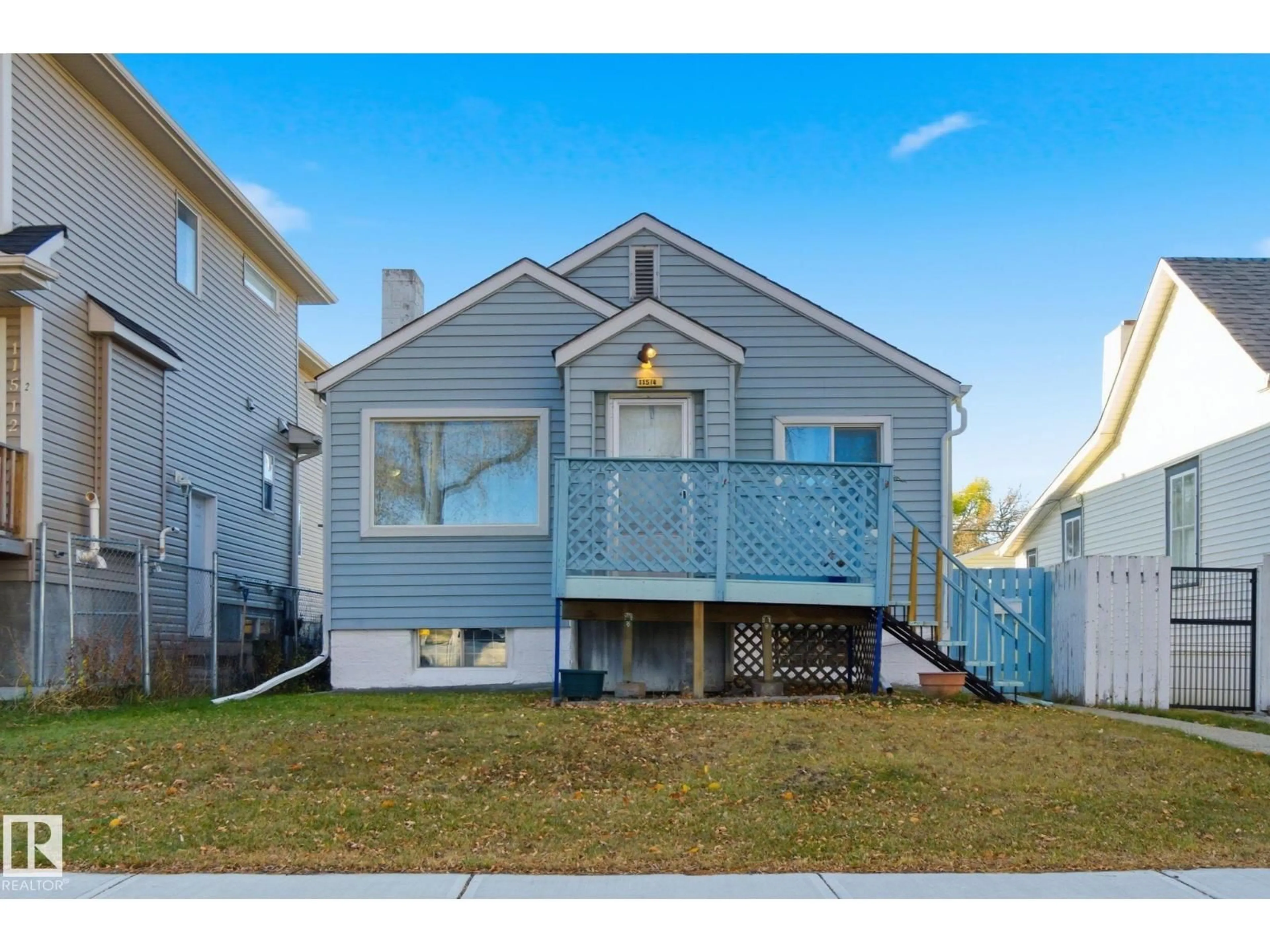Home with vinyl exterior material, street for 11514 92 ST, Edmonton Alberta T5G0Z7