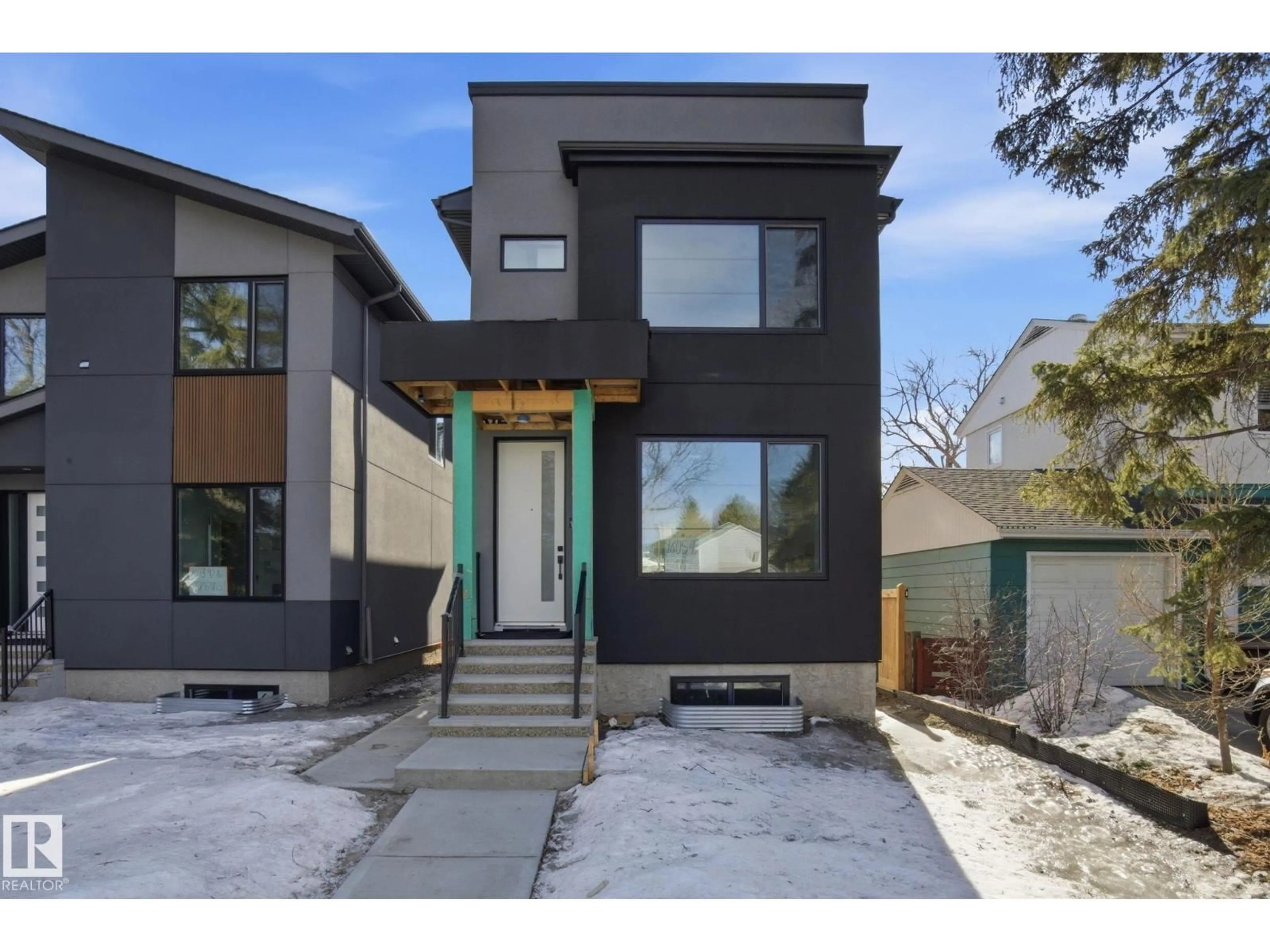 Home with brick exterior material, street for 7605 92 AV, Edmonton Alberta T6C1R3