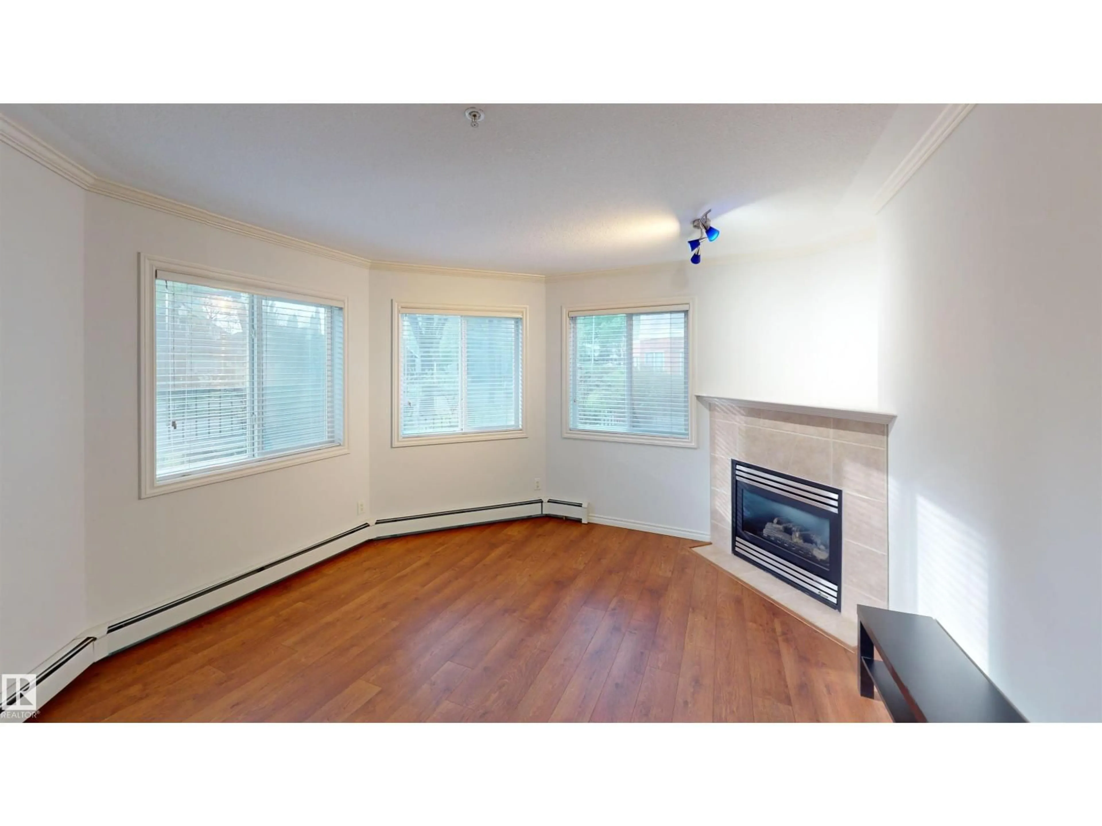 A pic of a room for #115 - 9938 104 ST, Edmonton Alberta T5K2X7