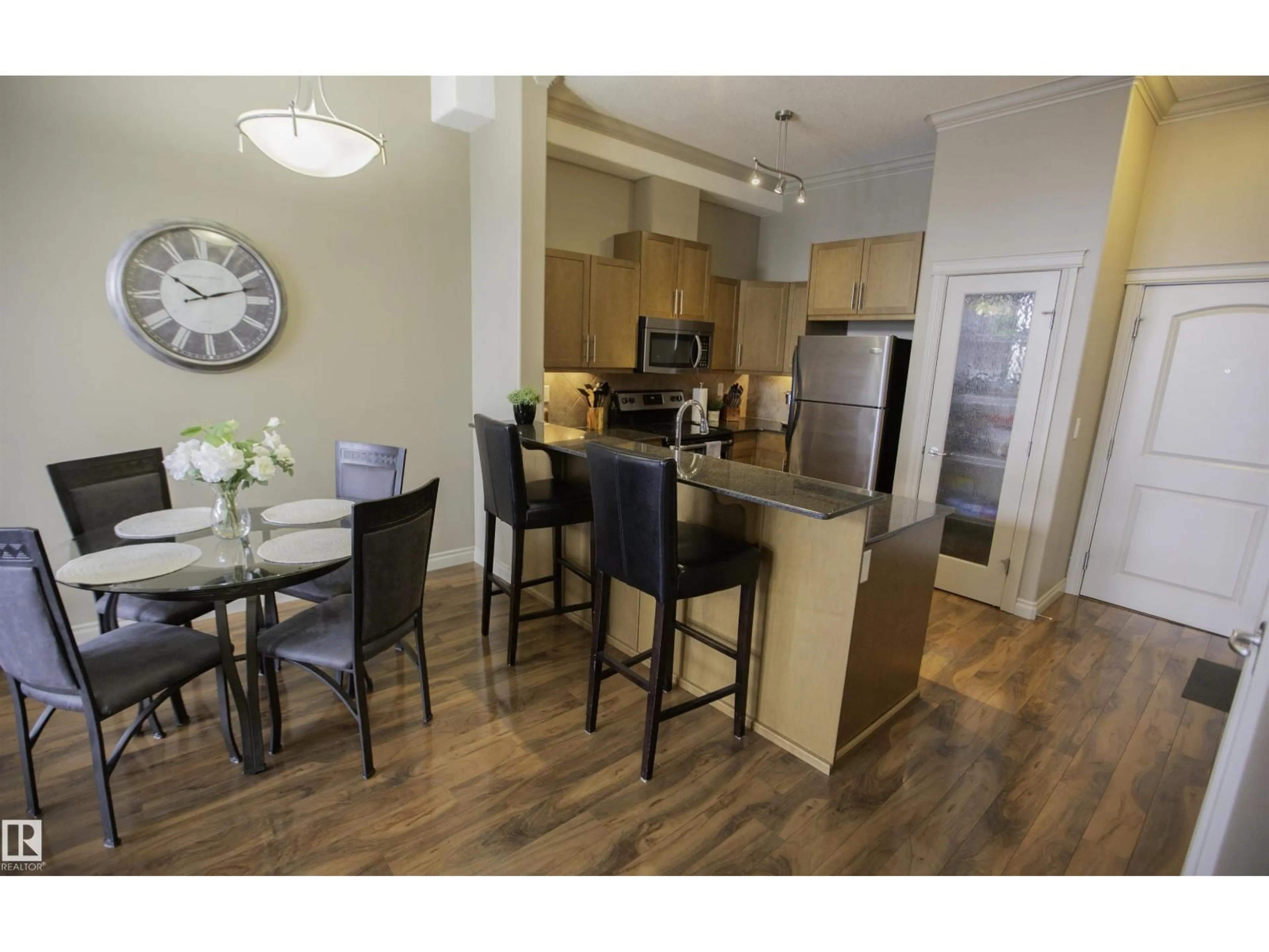 Open concept kitchen, wood/laminate floor for 432 10121 80 AV AV, Edmonton Alberta T6E0B9