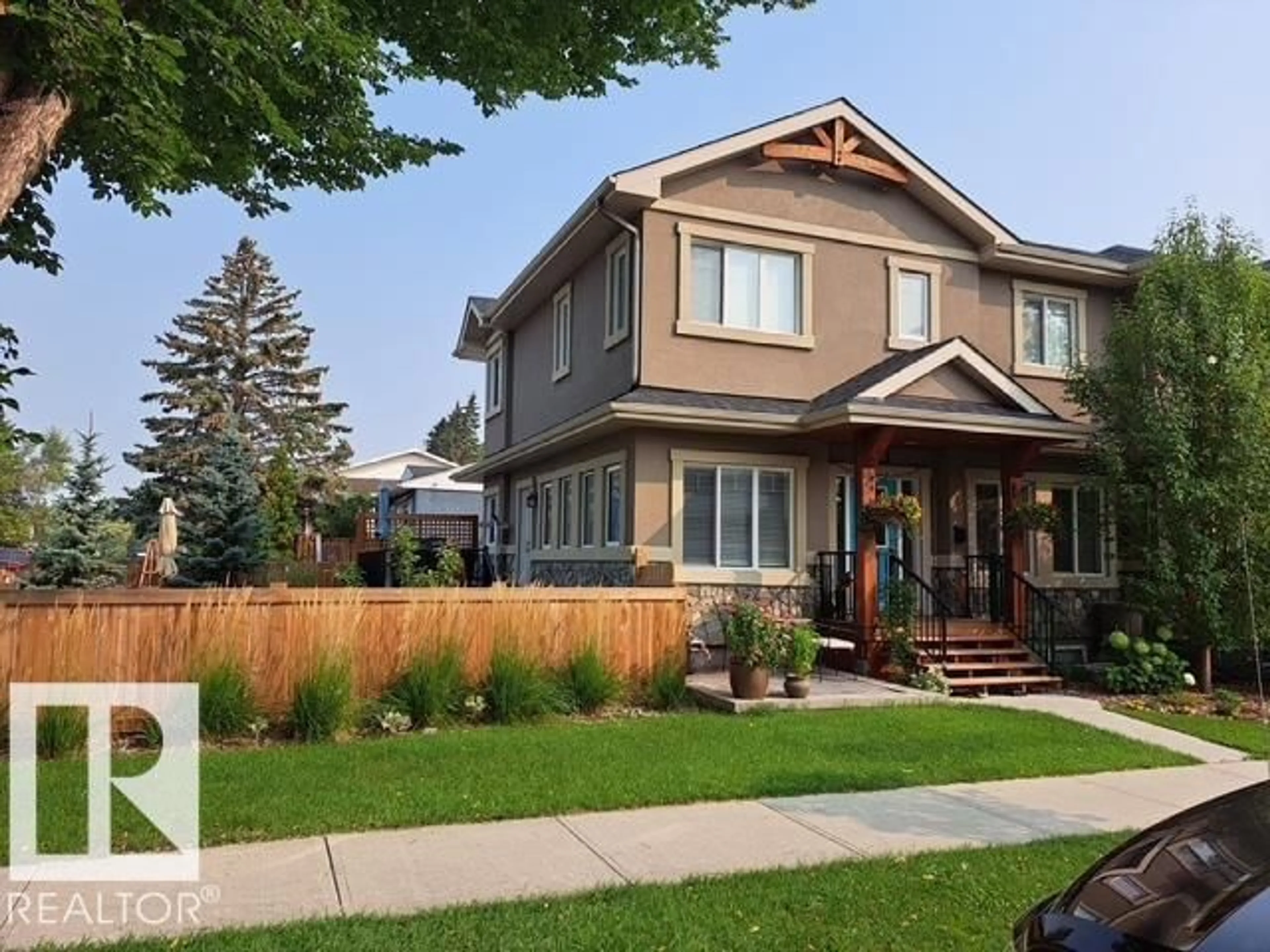 Home with vinyl exterior material, street for NW - 15222 105 AV, Edmonton Alberta T5P4J9