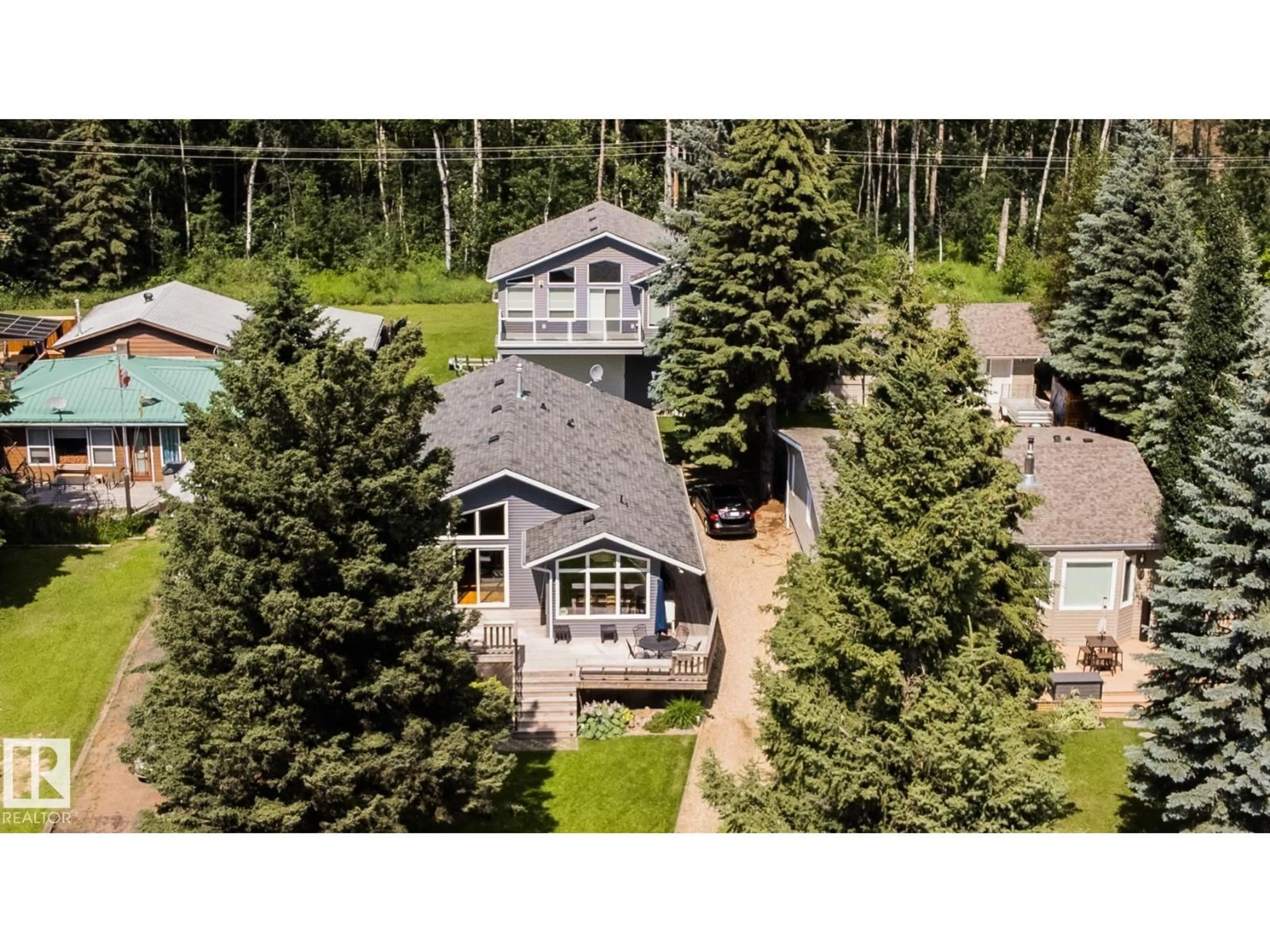 A pic from outside/outdoor area/front of a property/back of a property/a pic from drone, unknown for 31 LAKESHORE DR, Rural Leduc County Alberta T0C2C0