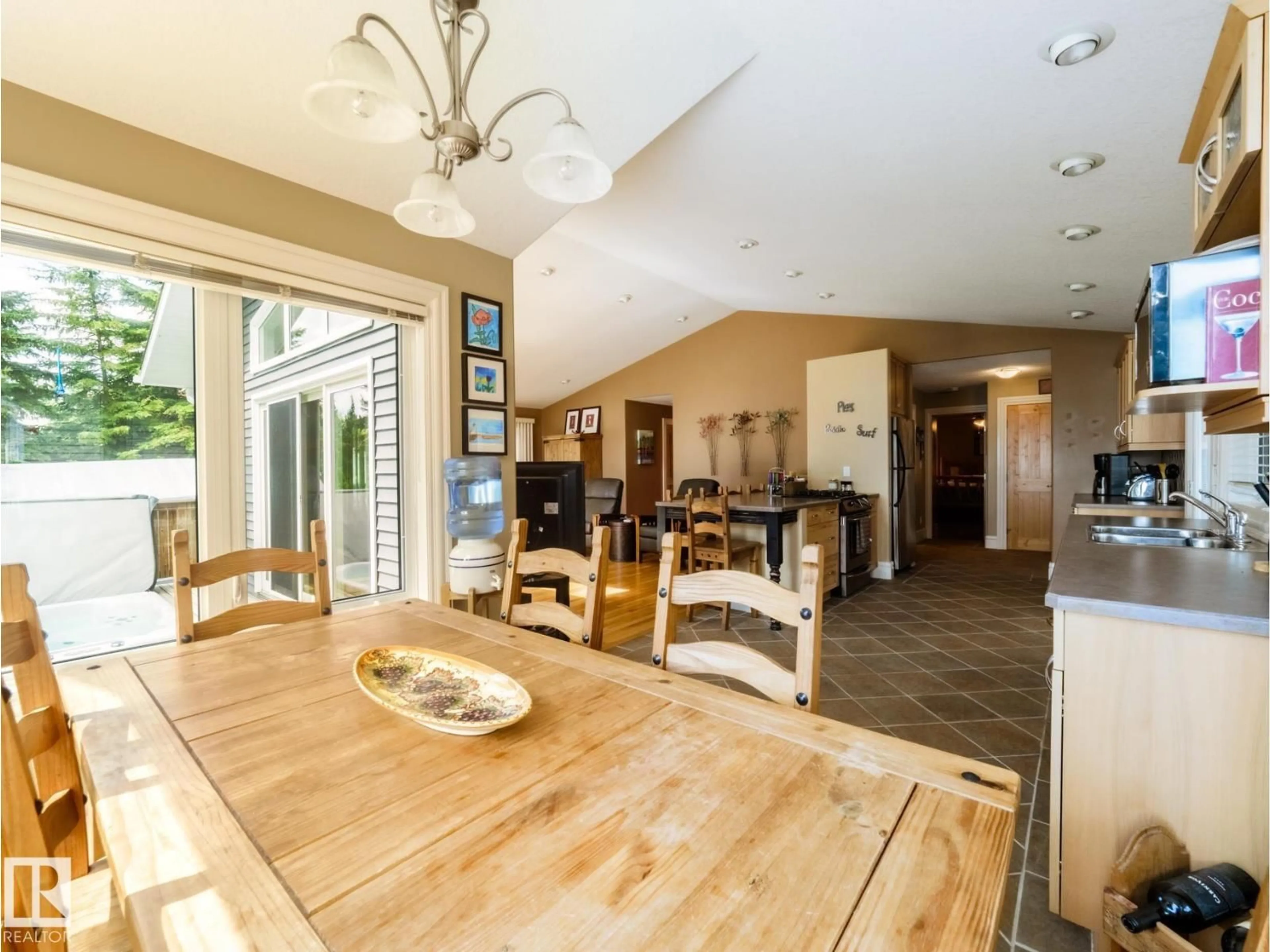 Open concept kitchen, wood/laminate floor for 31 LAKESHORE DR, Rural Leduc County Alberta T0C2C0