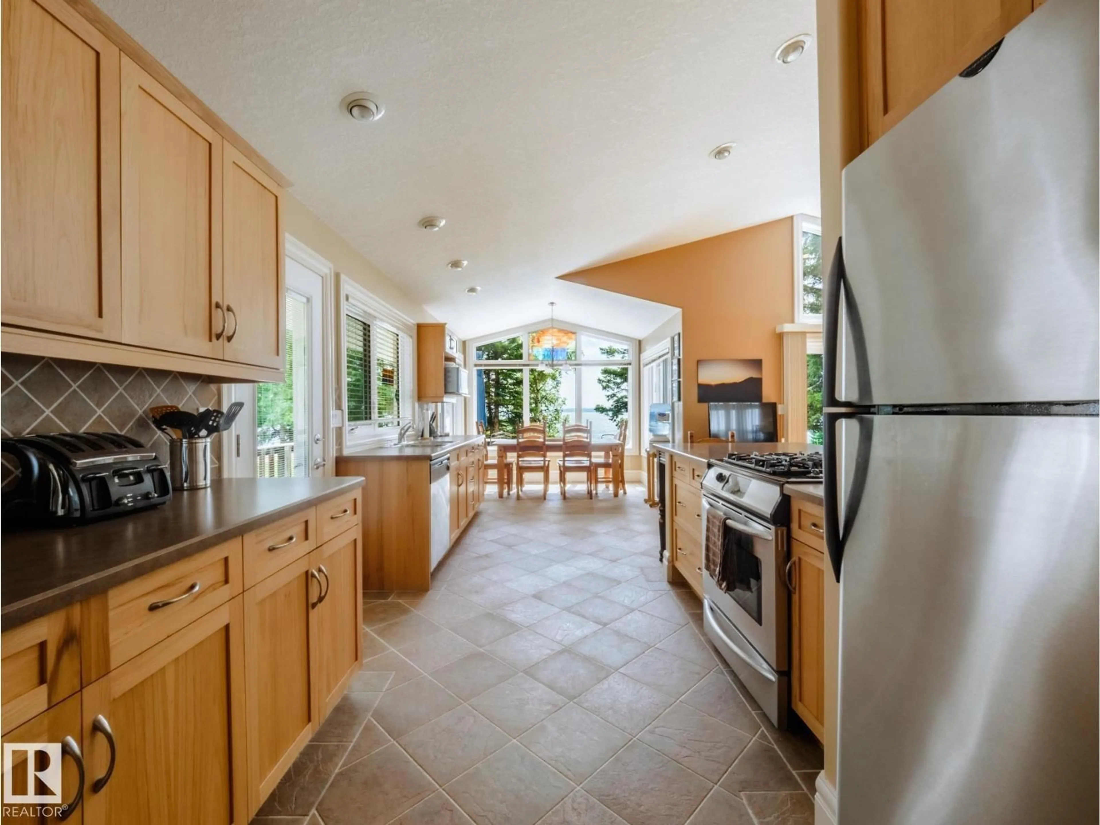 Open concept kitchen, ceramic/tile floor for 31 LAKESHORE DR, Rural Leduc County Alberta T0C2C0