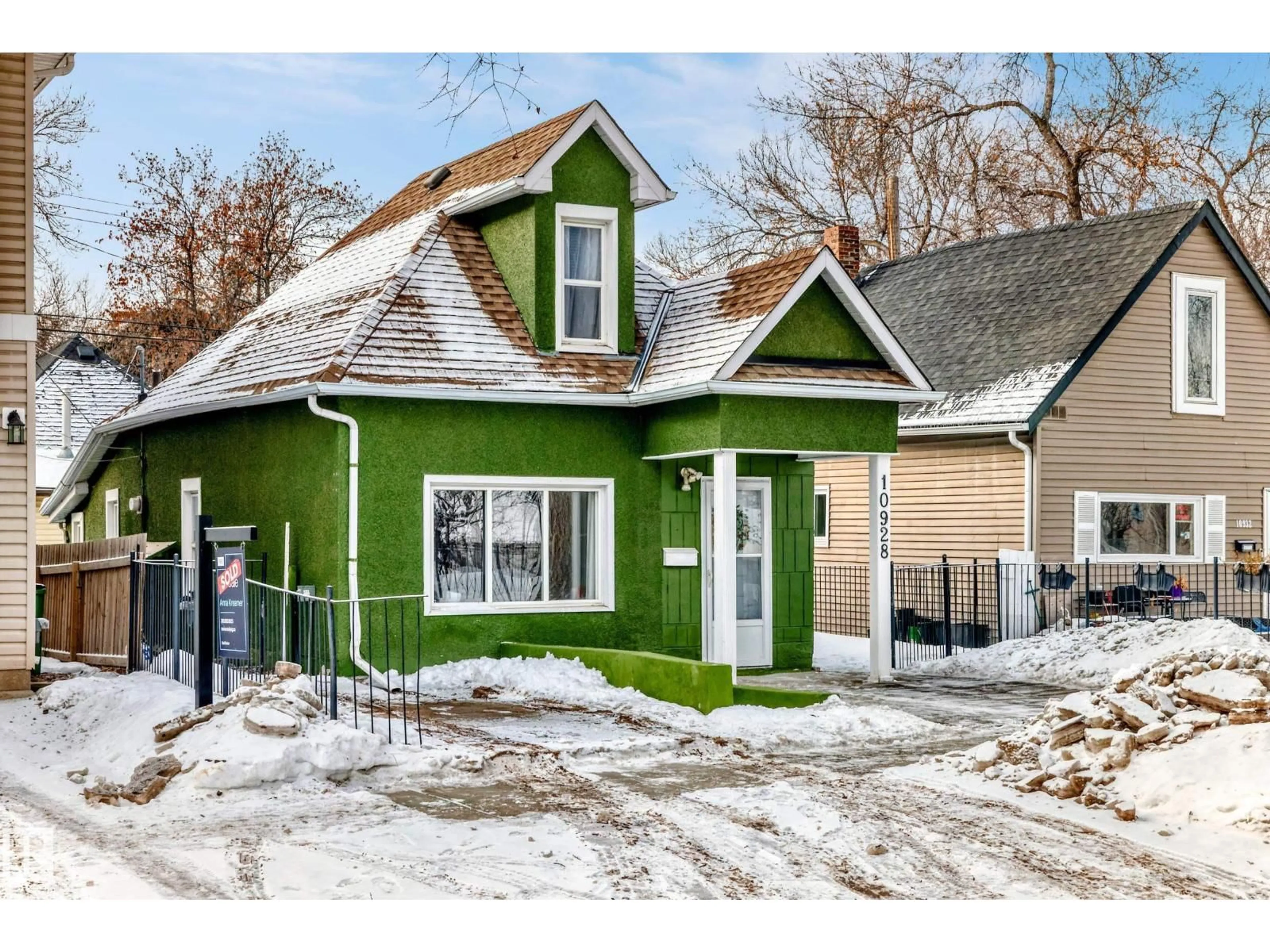 Home with vinyl exterior material, street for NW - 10928 92 ST, Edmonton Alberta T5H1W1