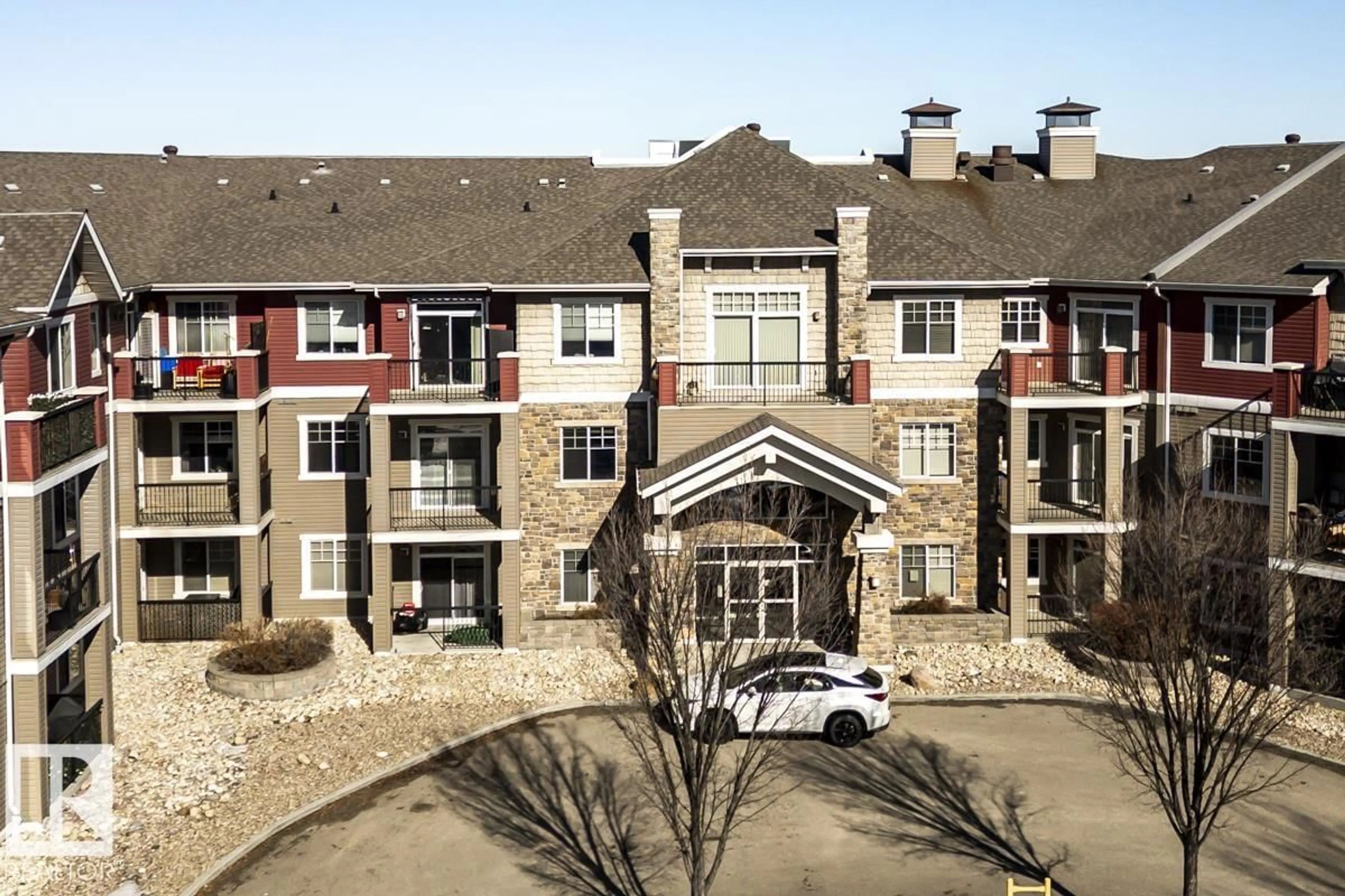 A pic from outside/outdoor area/front of a property/back of a property/a pic from drone, unknown for #210 - 2503 HANNA CR, Edmonton Alberta T6R0H1