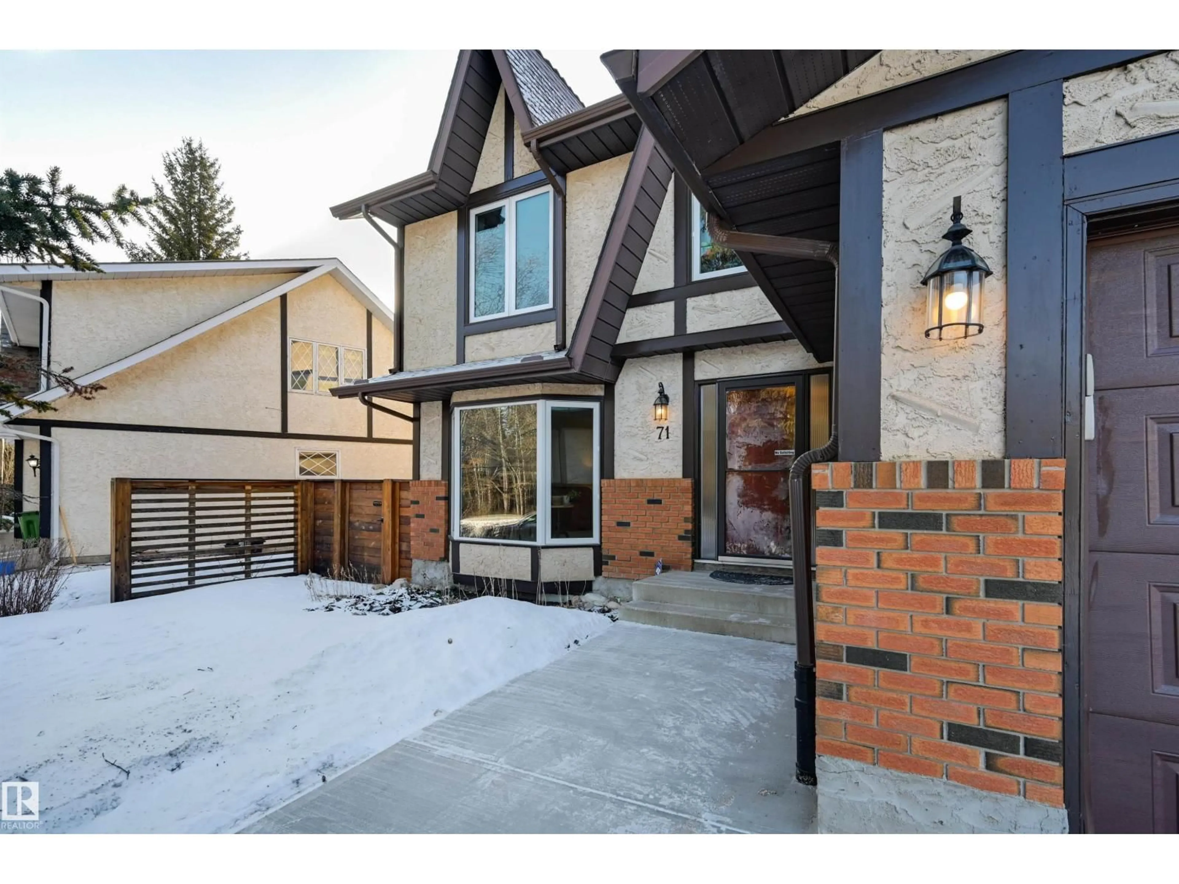 Home with brick exterior material, street for 71 WAKINA DR, Edmonton Alberta T5T2X4