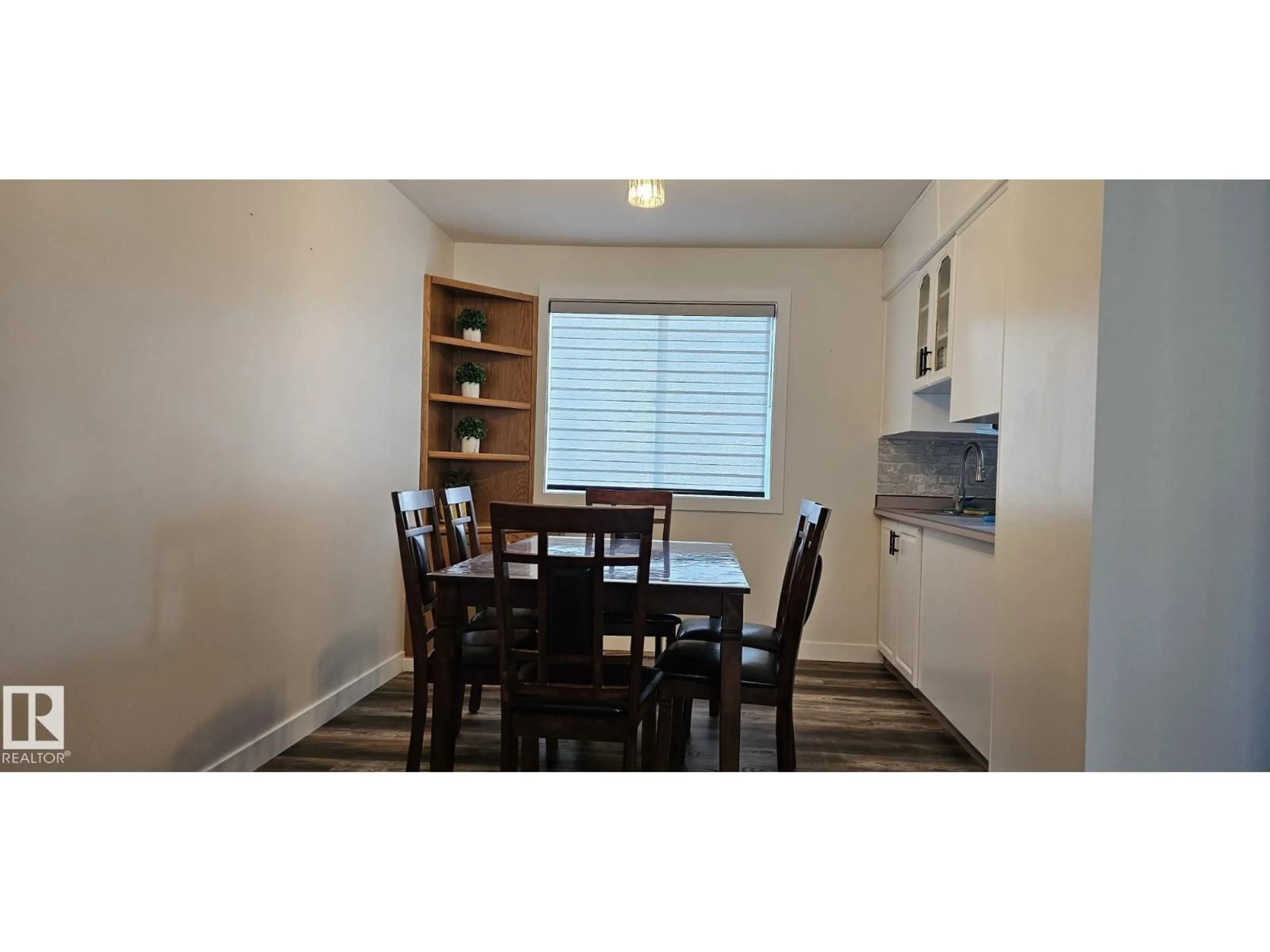 Dining room, wood/laminate floor for 4514 56 AV, Barrhead Alberta T7N1K6