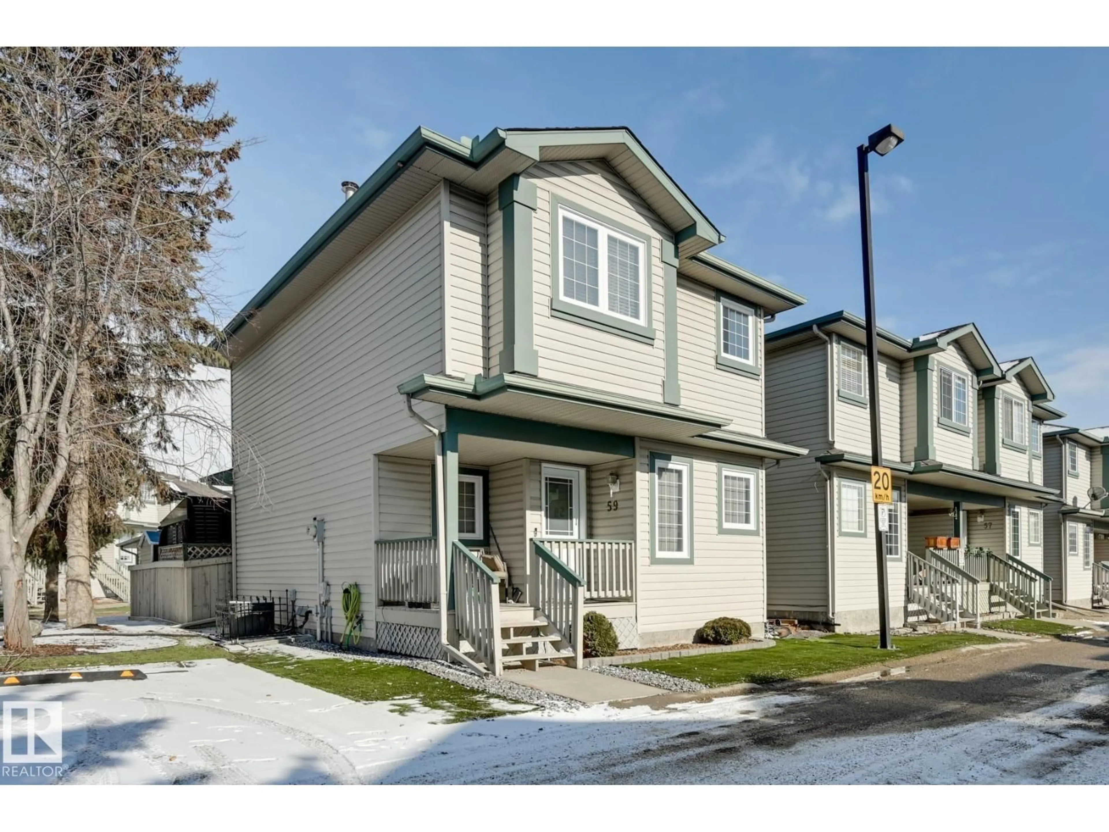 Home with vinyl exterior material, street for 14803 - 59 MILLER BV, Edmonton Alberta T5Y3A4