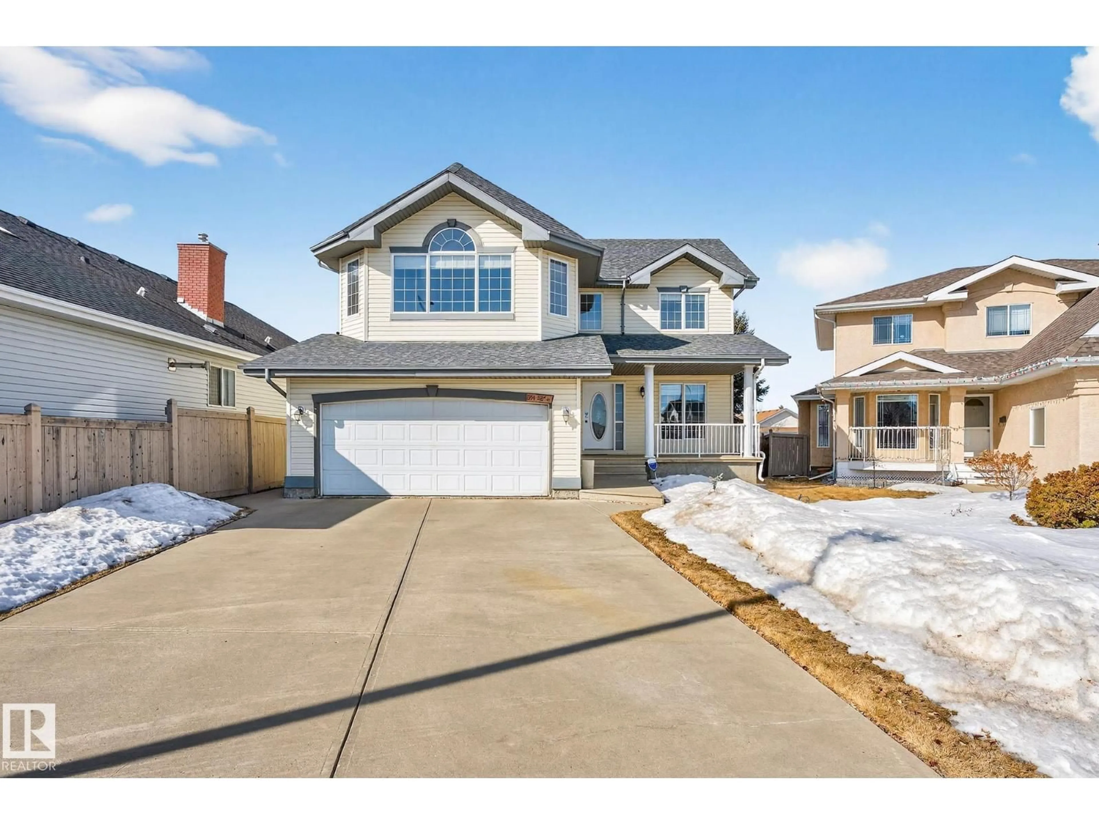 Home with vinyl exterior material, street for NW - 1354 118A ST, Edmonton Alberta T6J7G2