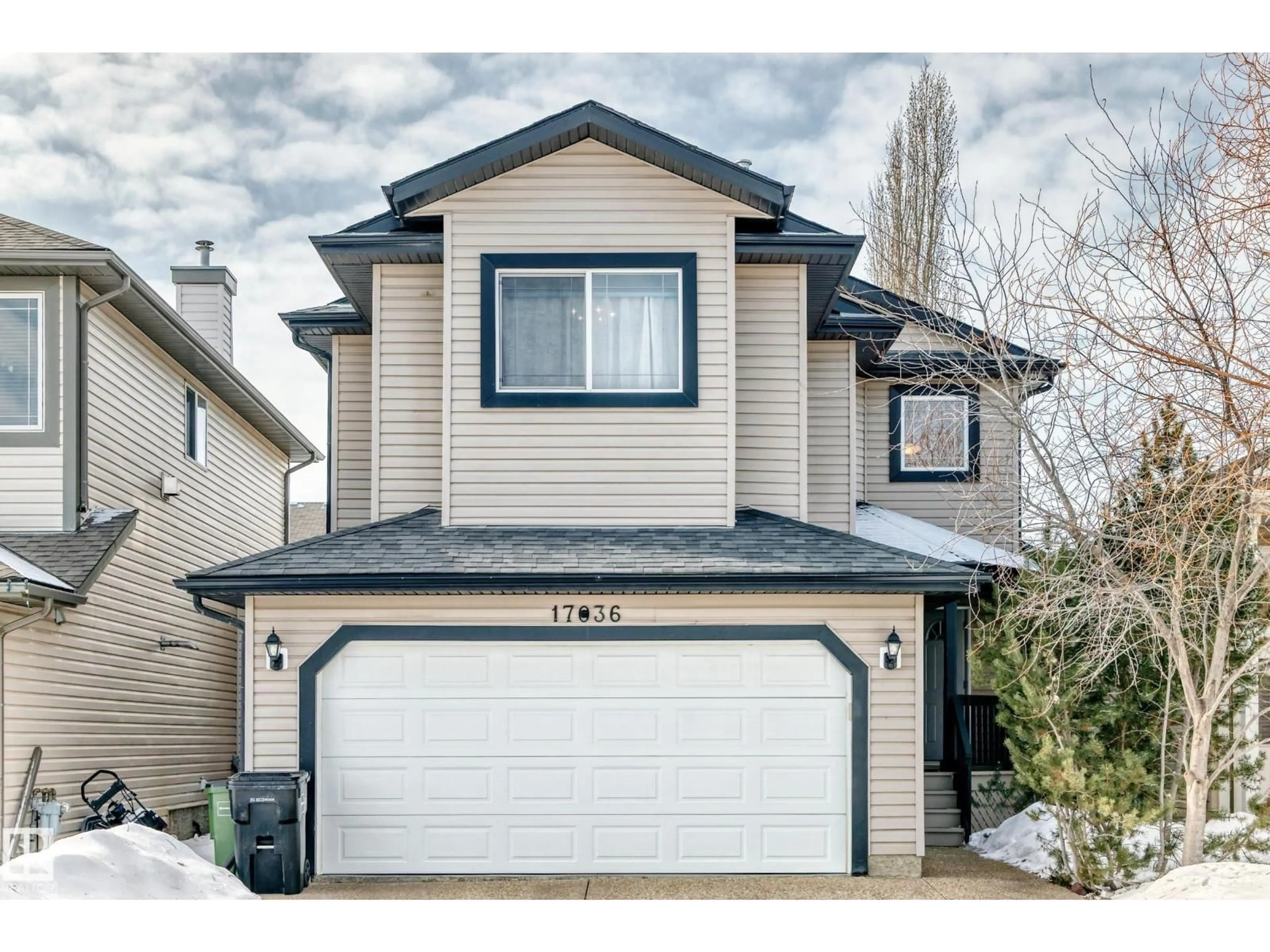 Home with vinyl exterior material, street for NW - 17036 119 ST, Edmonton Alberta T5X6H8