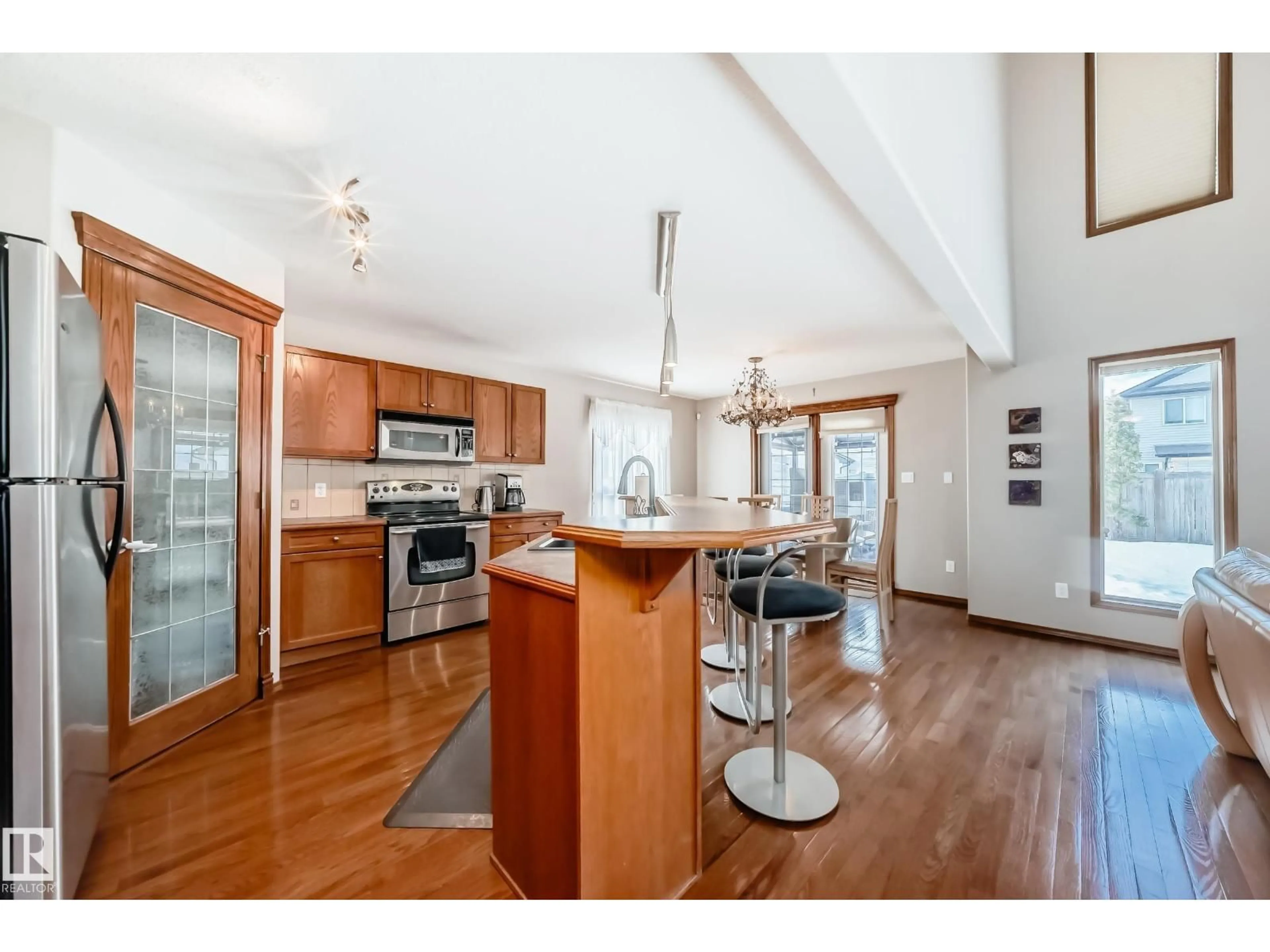 Open concept kitchen, wood/laminate floor for NW - 17036 119 ST, Edmonton Alberta T5X6H8