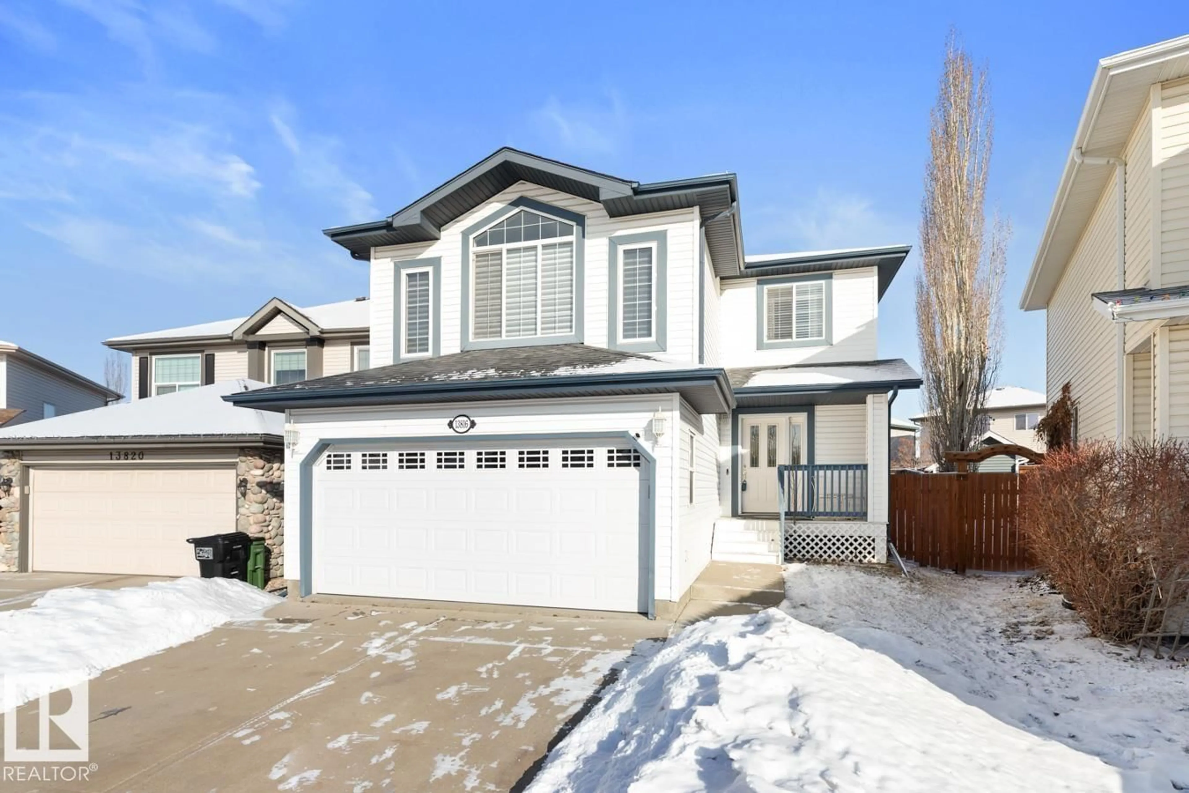 Home with vinyl exterior material, street for NW - 13816 148 AV, Edmonton Alberta T6V1S1