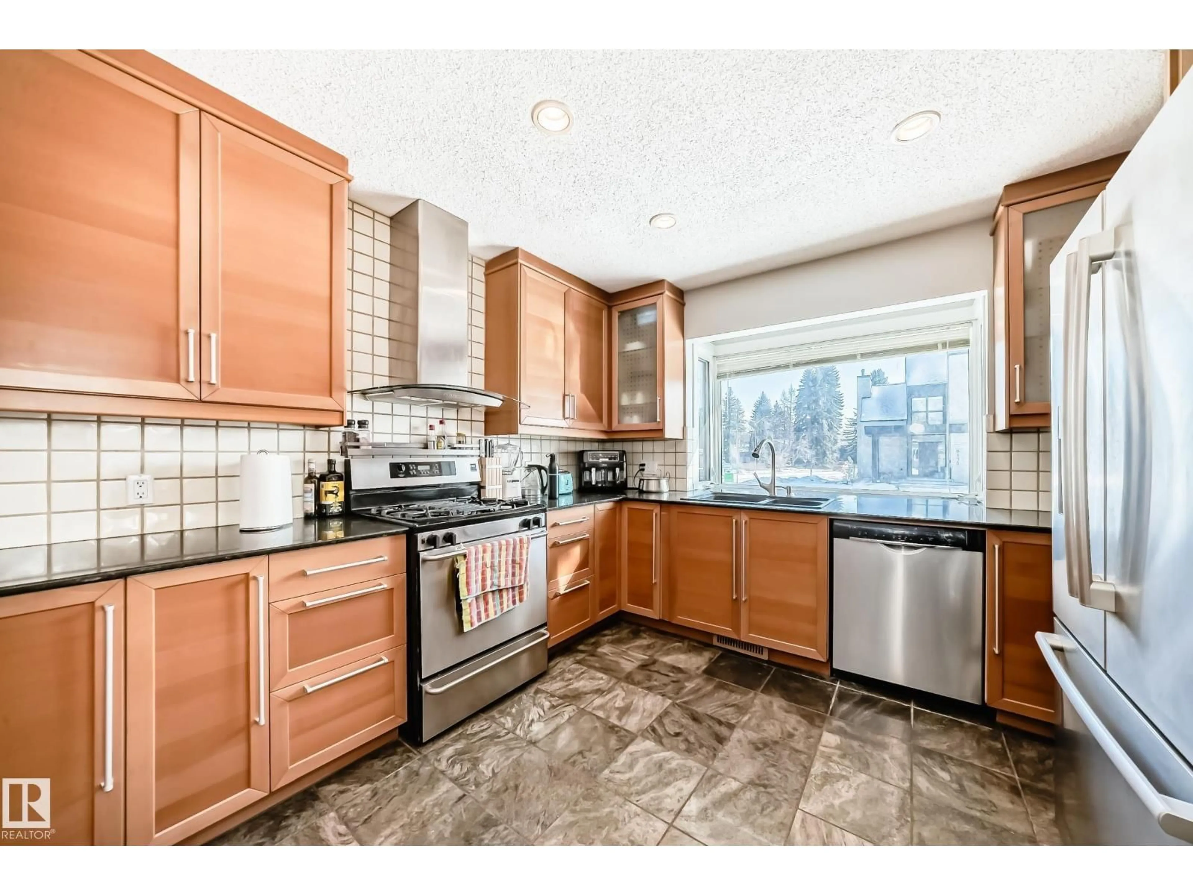 Open concept kitchen, ceramic/tile floor for NW - 9136 141 ST, Edmonton Alberta T5R0L4