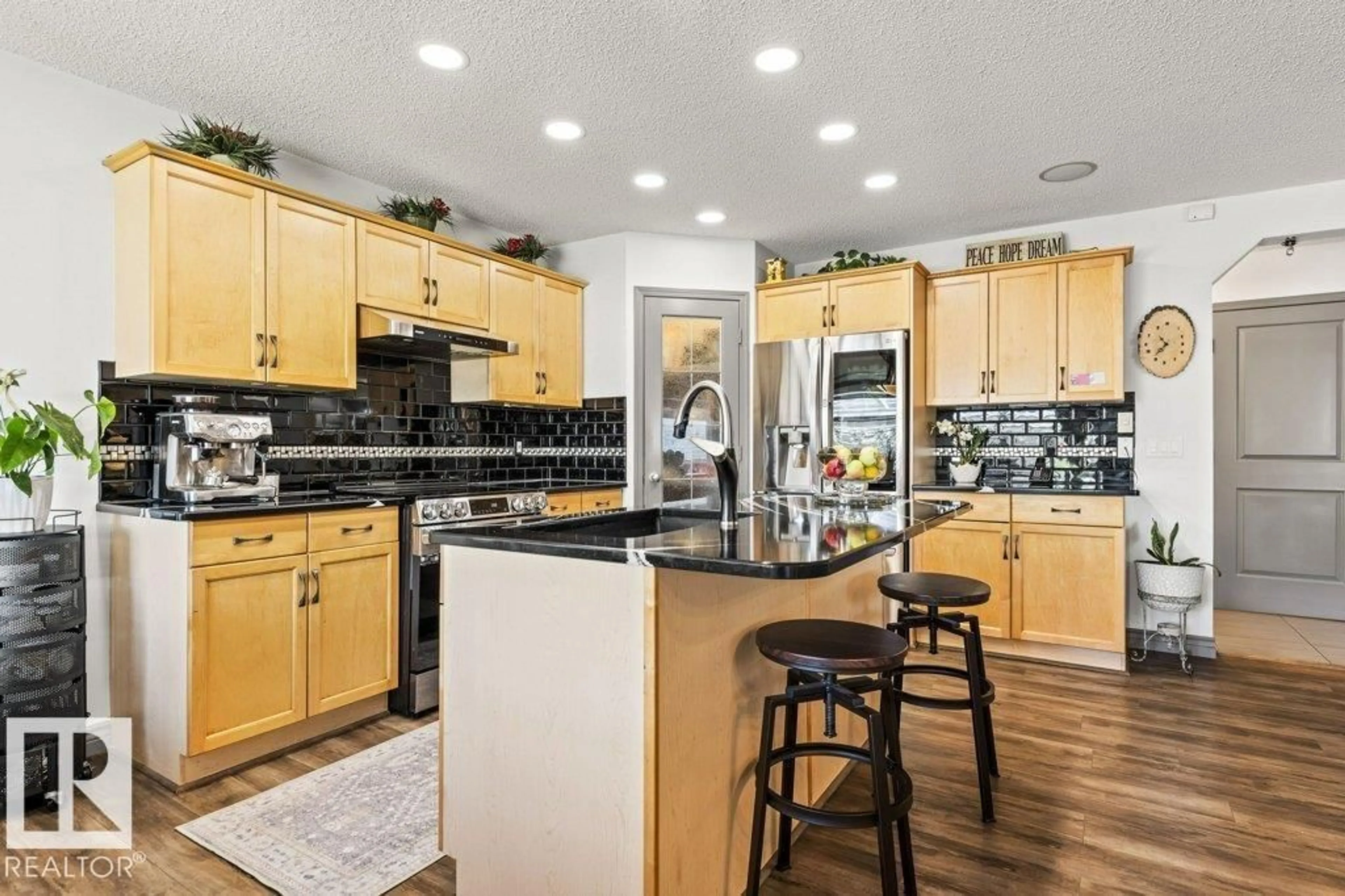 Open concept kitchen, unknown for 16820 57 ST, Edmonton Alberta T5Y0K4