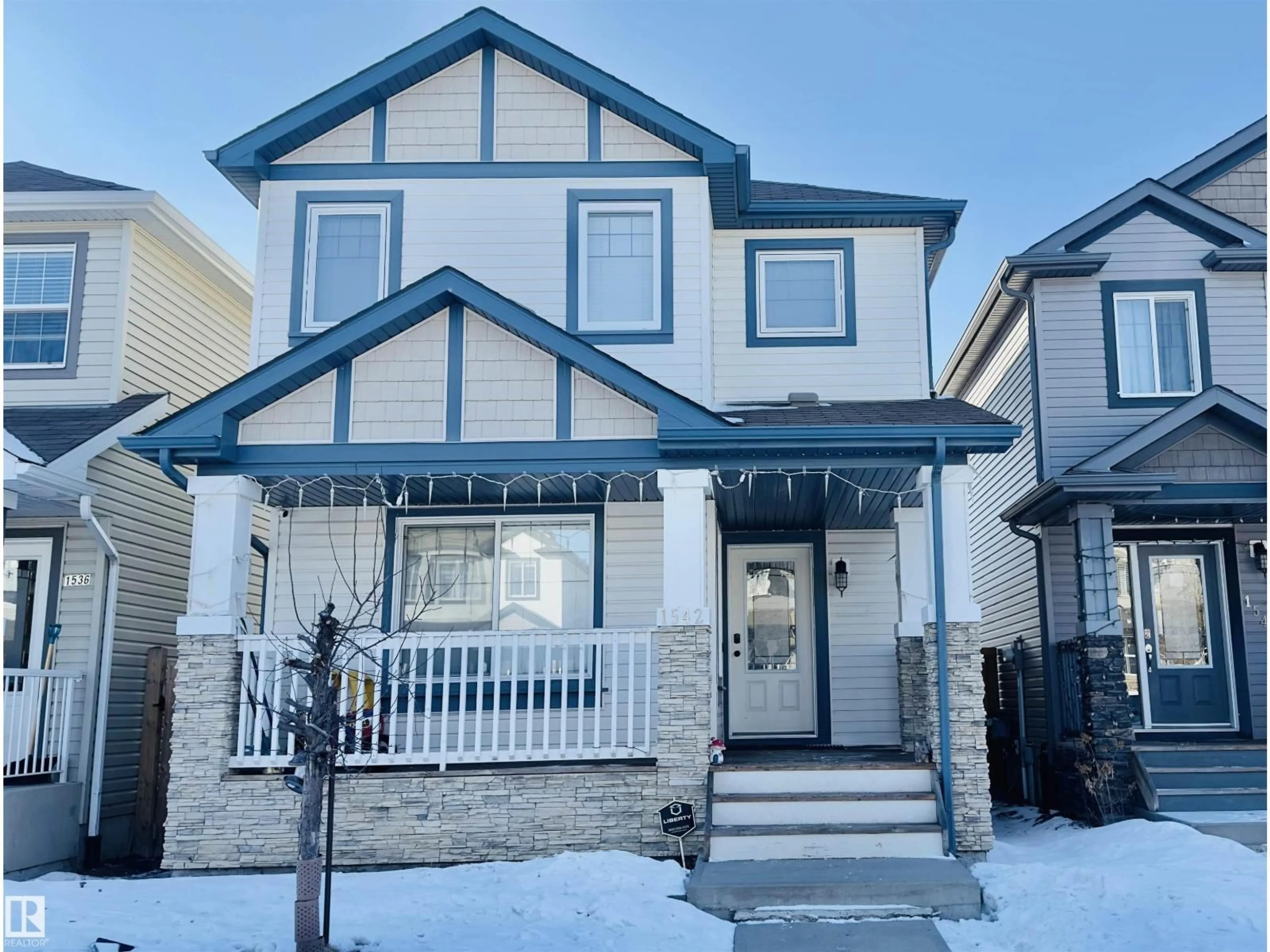 Home with vinyl exterior material, street for NW - 1542 33A ST, Edmonton Alberta T6T0X5