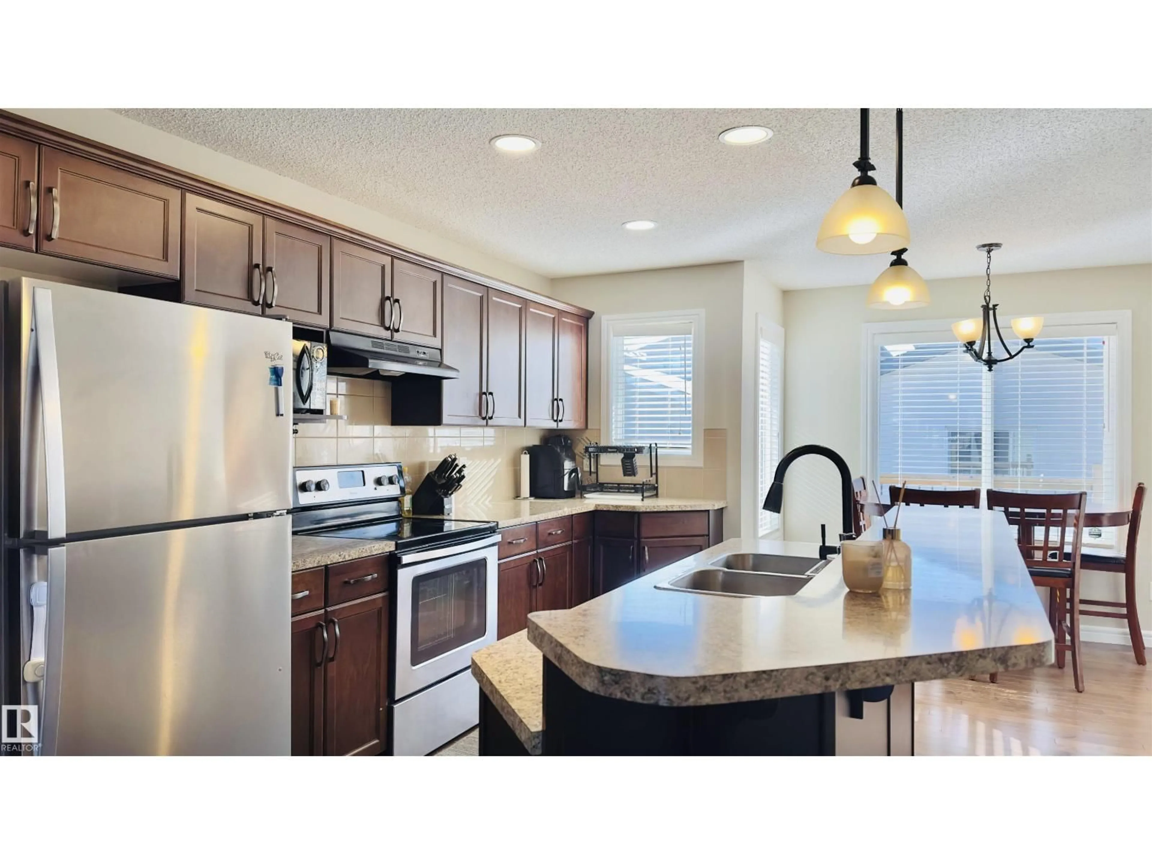 Open concept kitchen, ceramic/tile floor for NW - 1542 33A ST, Edmonton Alberta T6T0X5