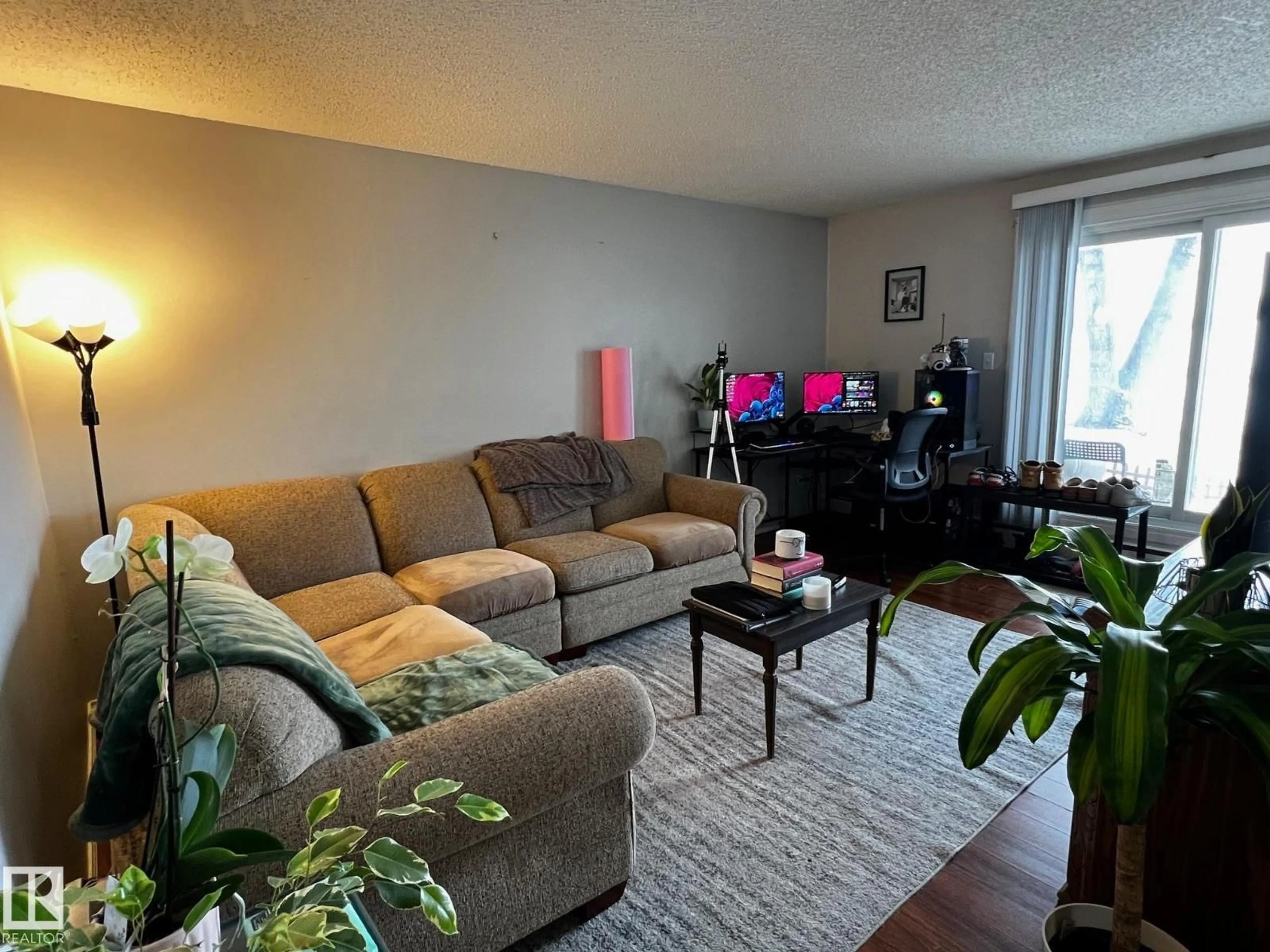 Living room with furniture, unknown for 12 11265 31 AV NW, Edmonton Alberta T6J3V7
