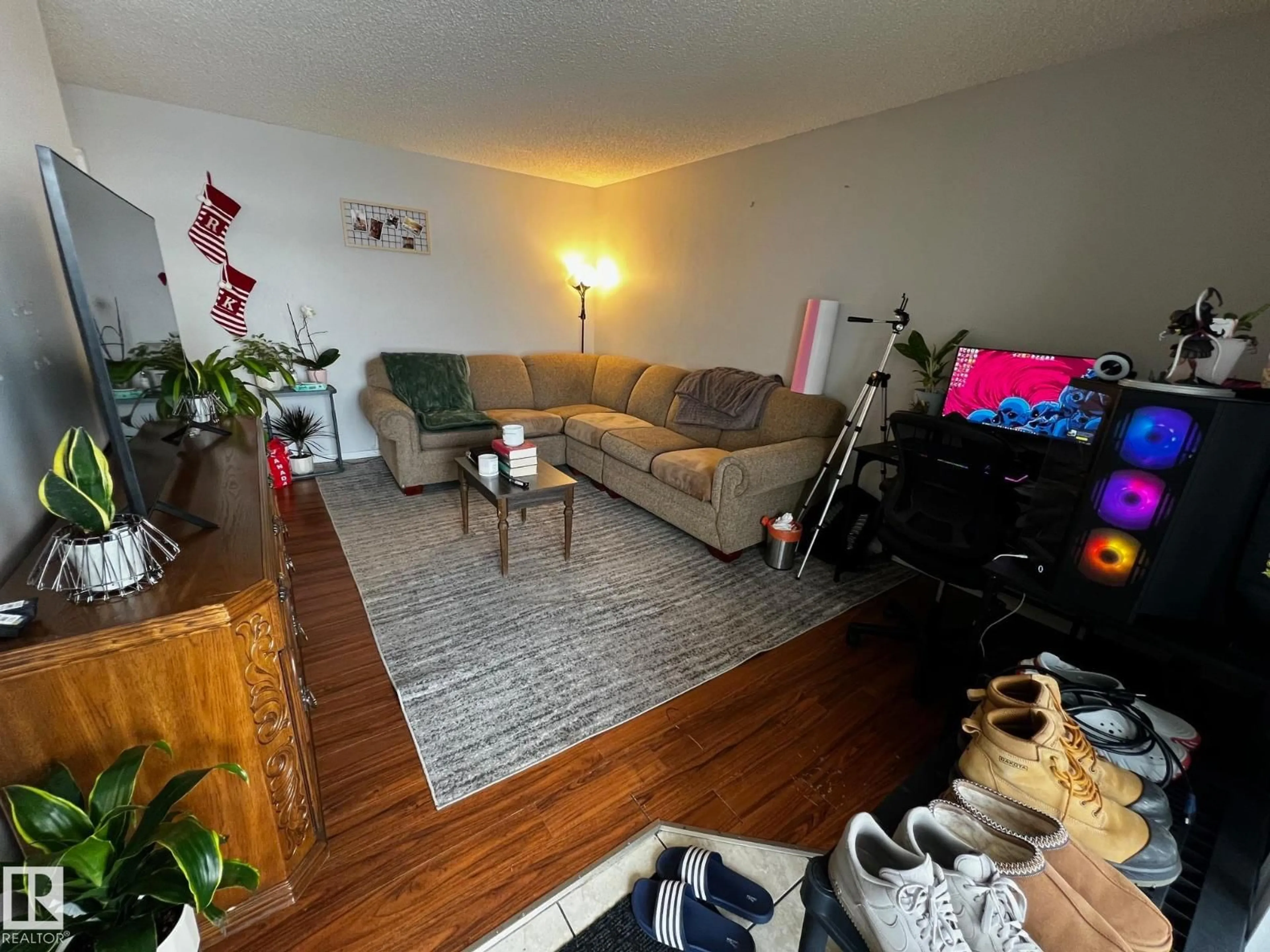 Living room with furniture, unknown for 12 11265 31 AV NW, Edmonton Alberta T6J3V7
