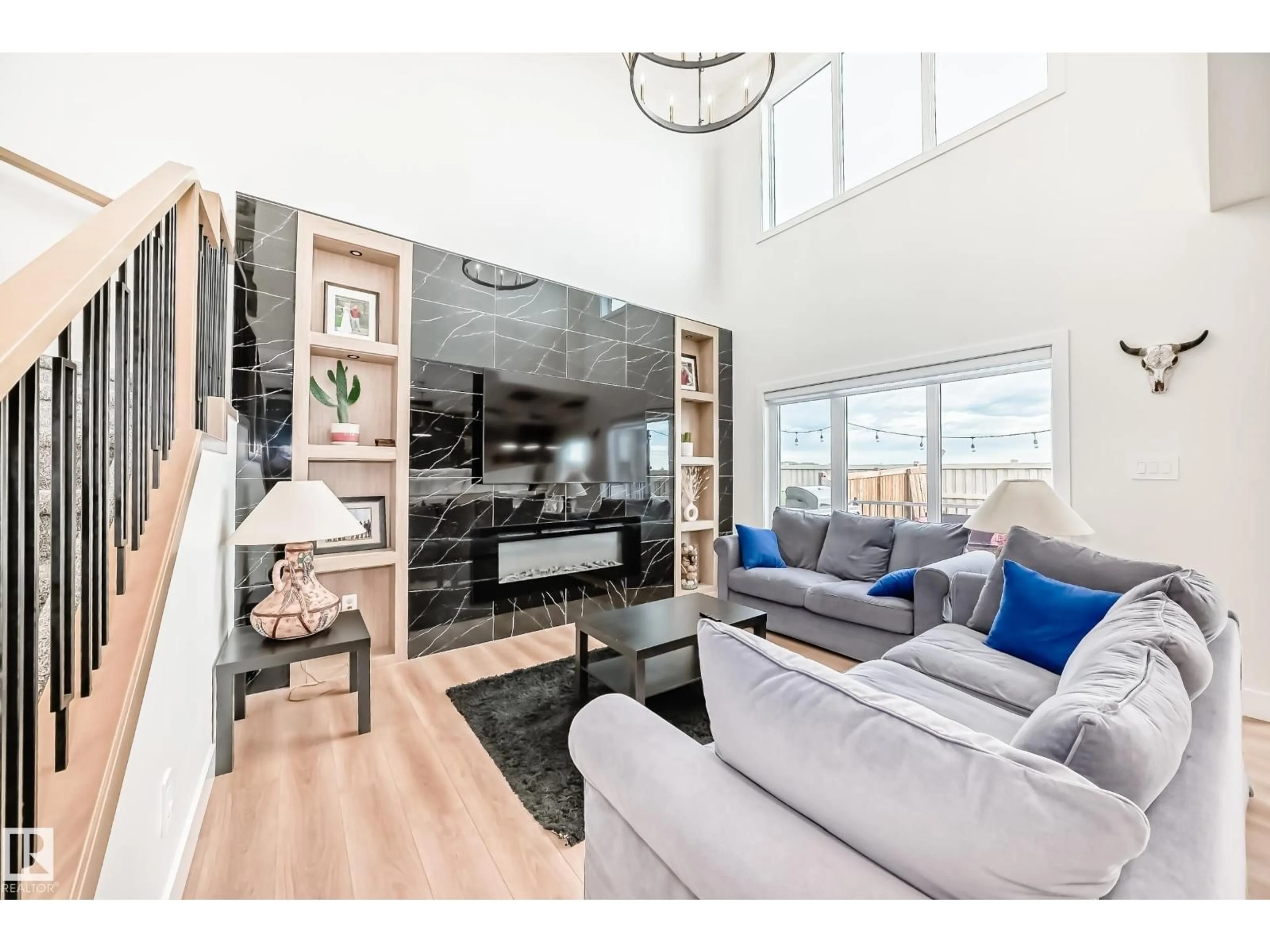 Living room with furniture, wood/laminate floor for 14 EDGEFIELD WY, St. Albert Alberta T8N8A1