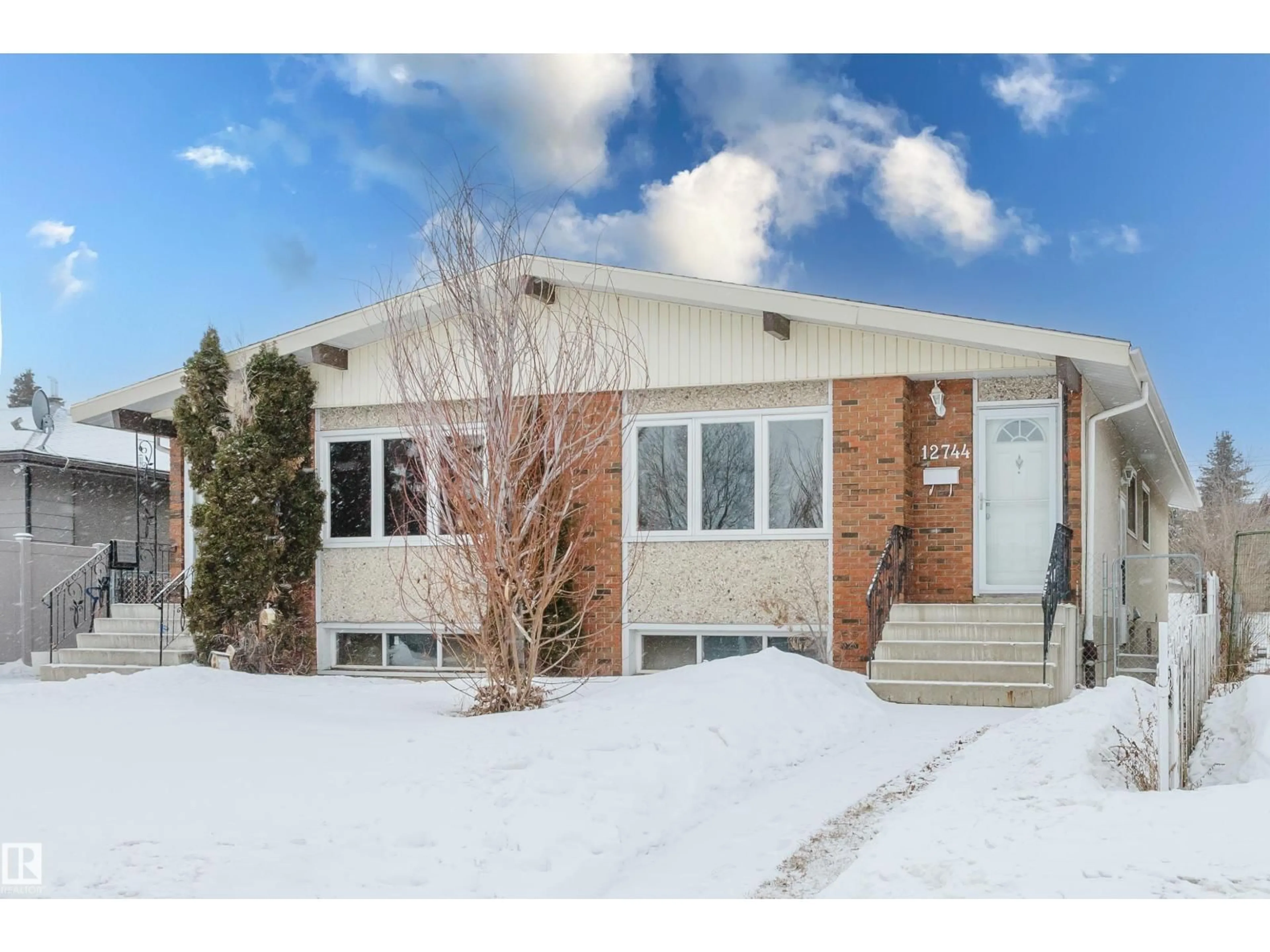Home with brick exterior material, street for 12744 - 12742 86 ST NW, Edmonton Alberta T5E3A8
