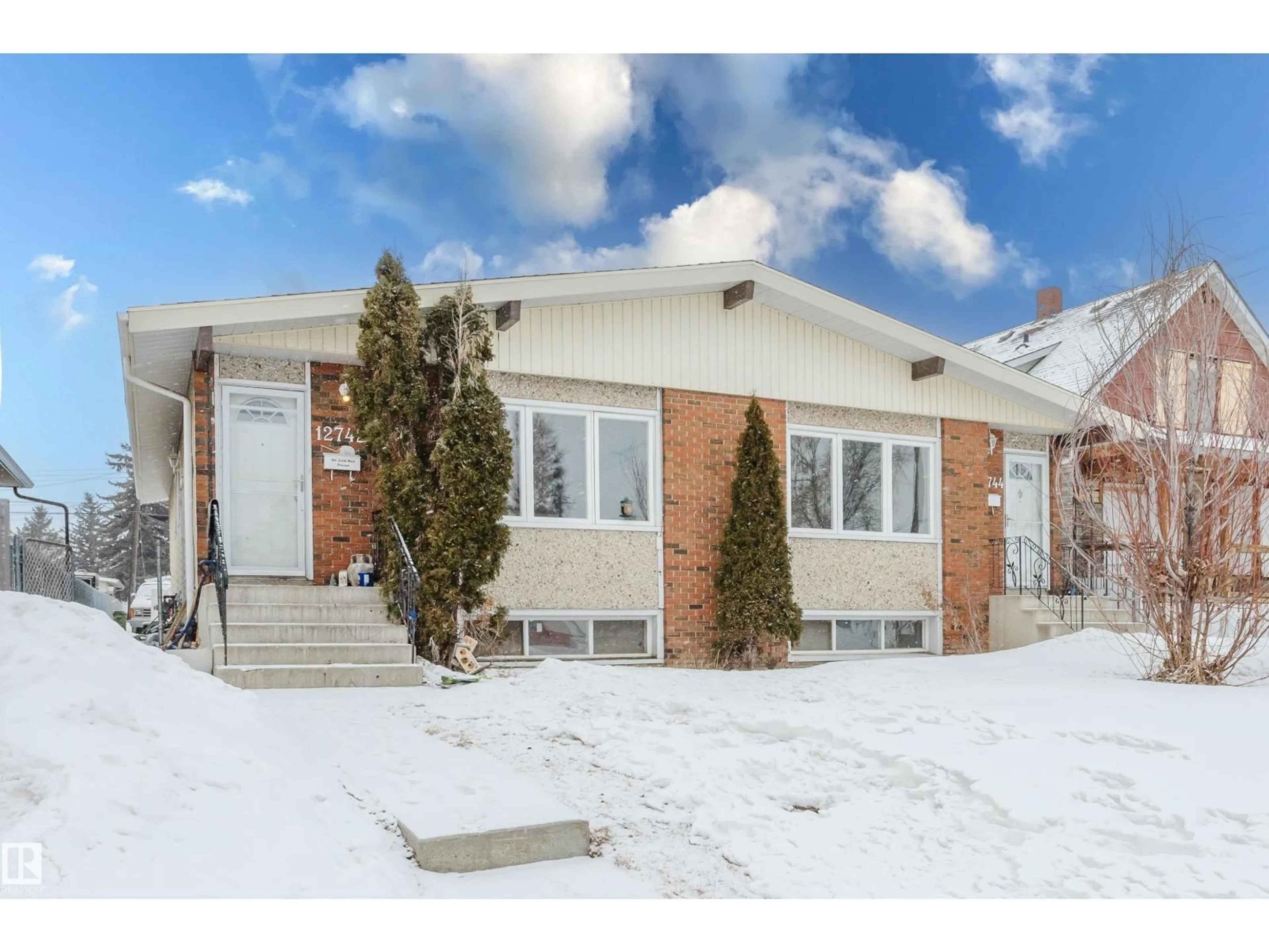 Home with brick exterior material, street for 12744 - 12742 86 ST NW, Edmonton Alberta T5E3A8