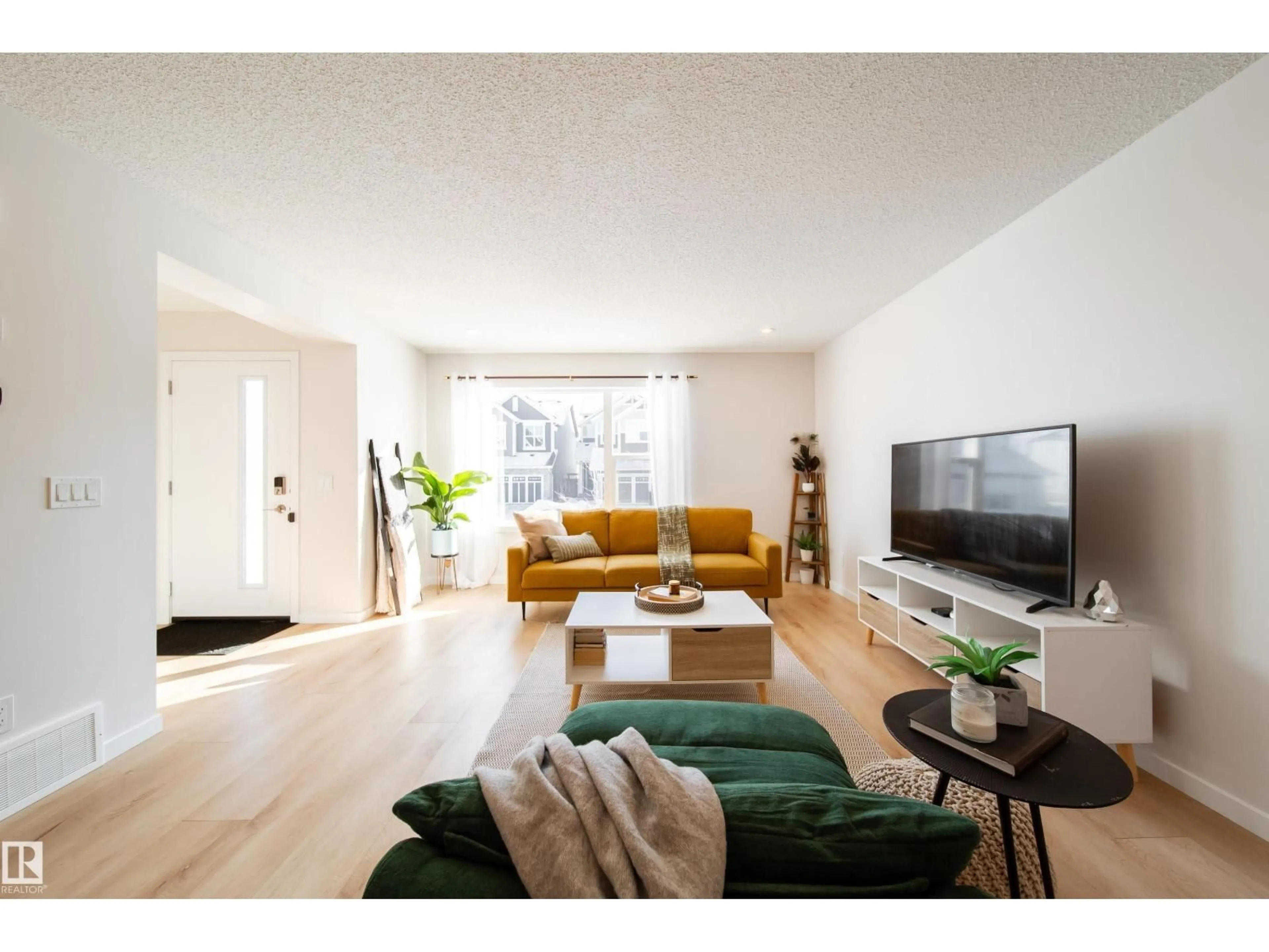 Living room with furniture, unknown for 112 STONEHOUSE WY, Leduc Alberta T9E1R1