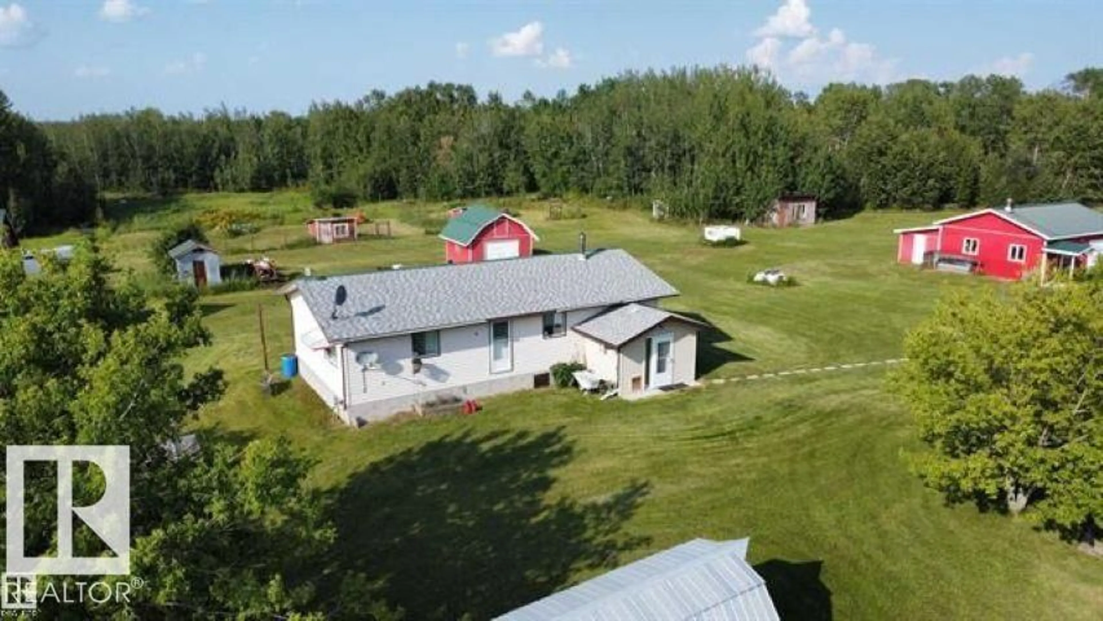 A pic from outside/outdoor area/front of a property/back of a property/a pic from drone, building for 61220 235 RD, Rural Westlock County Alberta T0G1W0