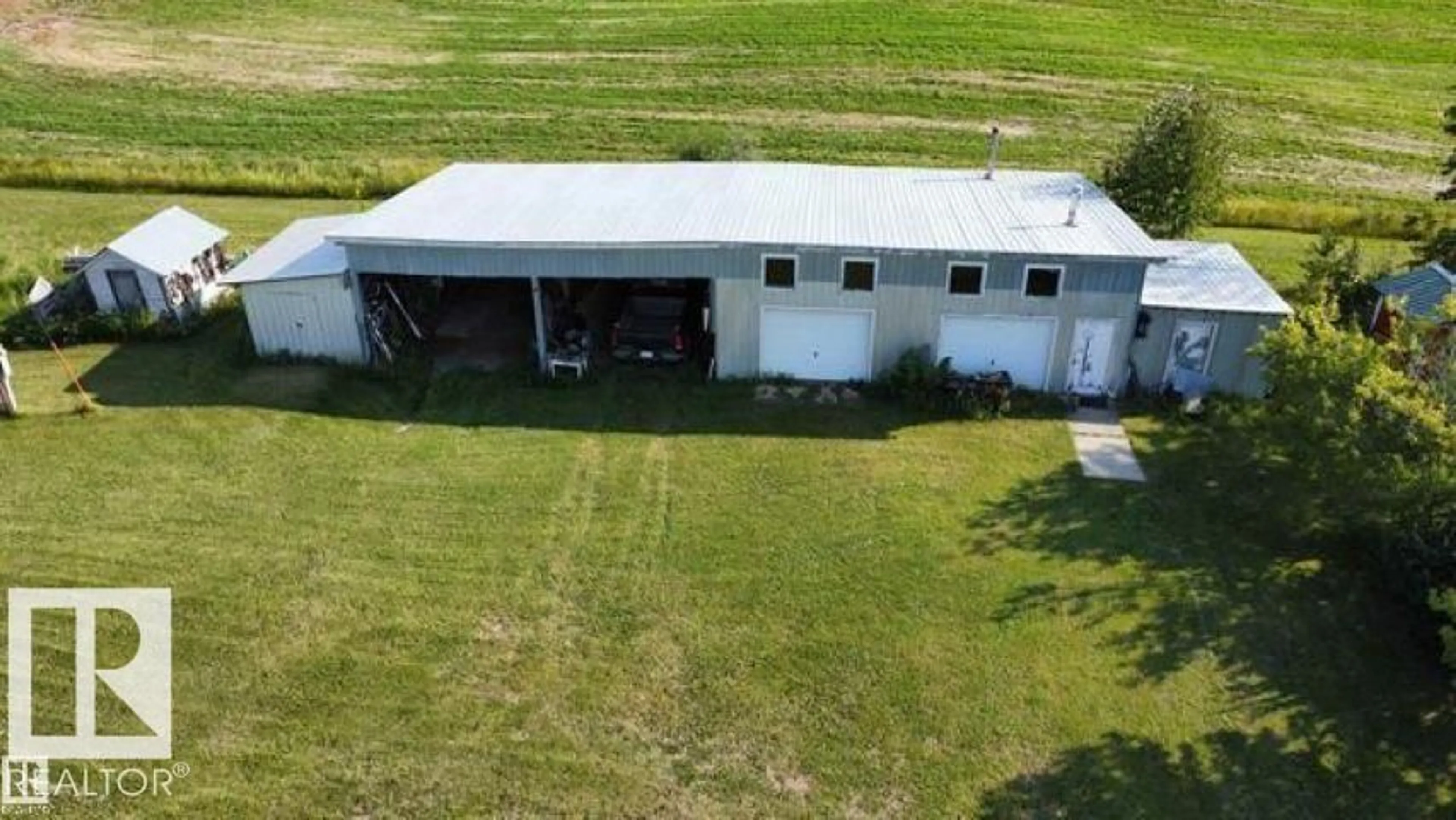 A pic from outside/outdoor area/front of a property/back of a property/a pic from drone, building for 61220 235 RD, Rural Westlock County Alberta T0G1W0