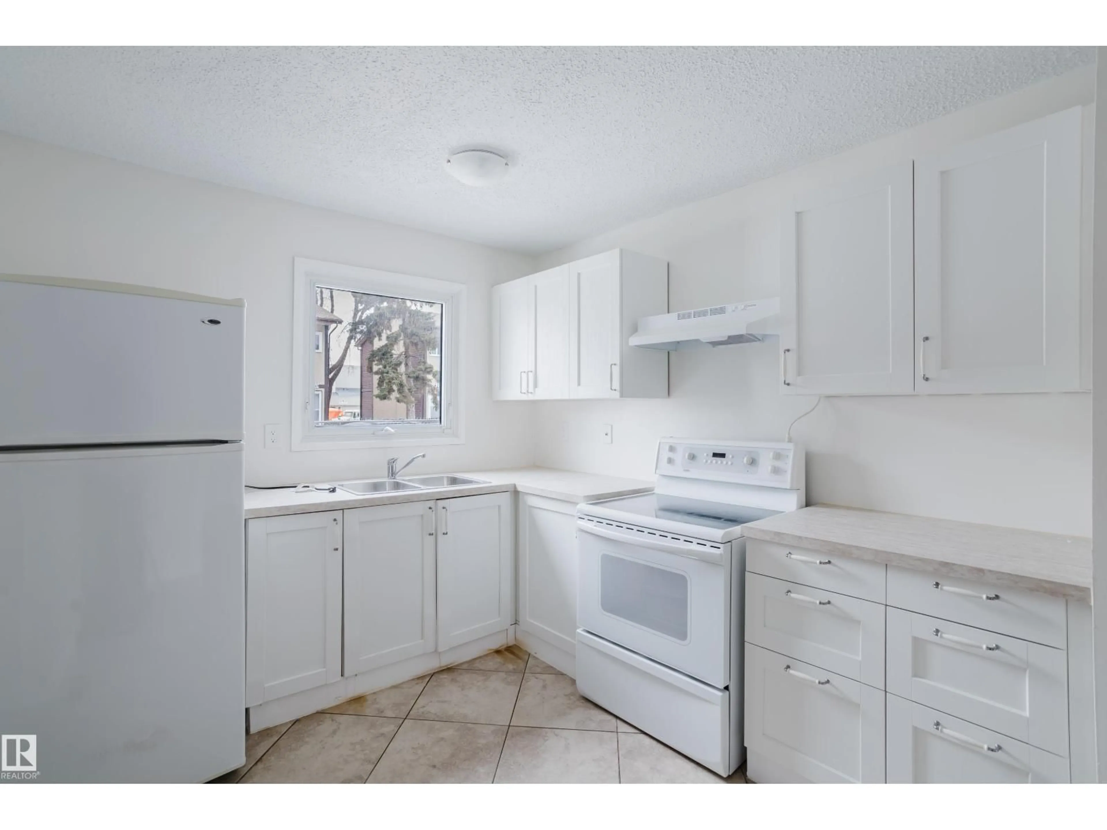 Standard kitchen, ceramic/tile floor for 4 BELMEAD GARDENS GD, Edmonton Alberta T5T1J1