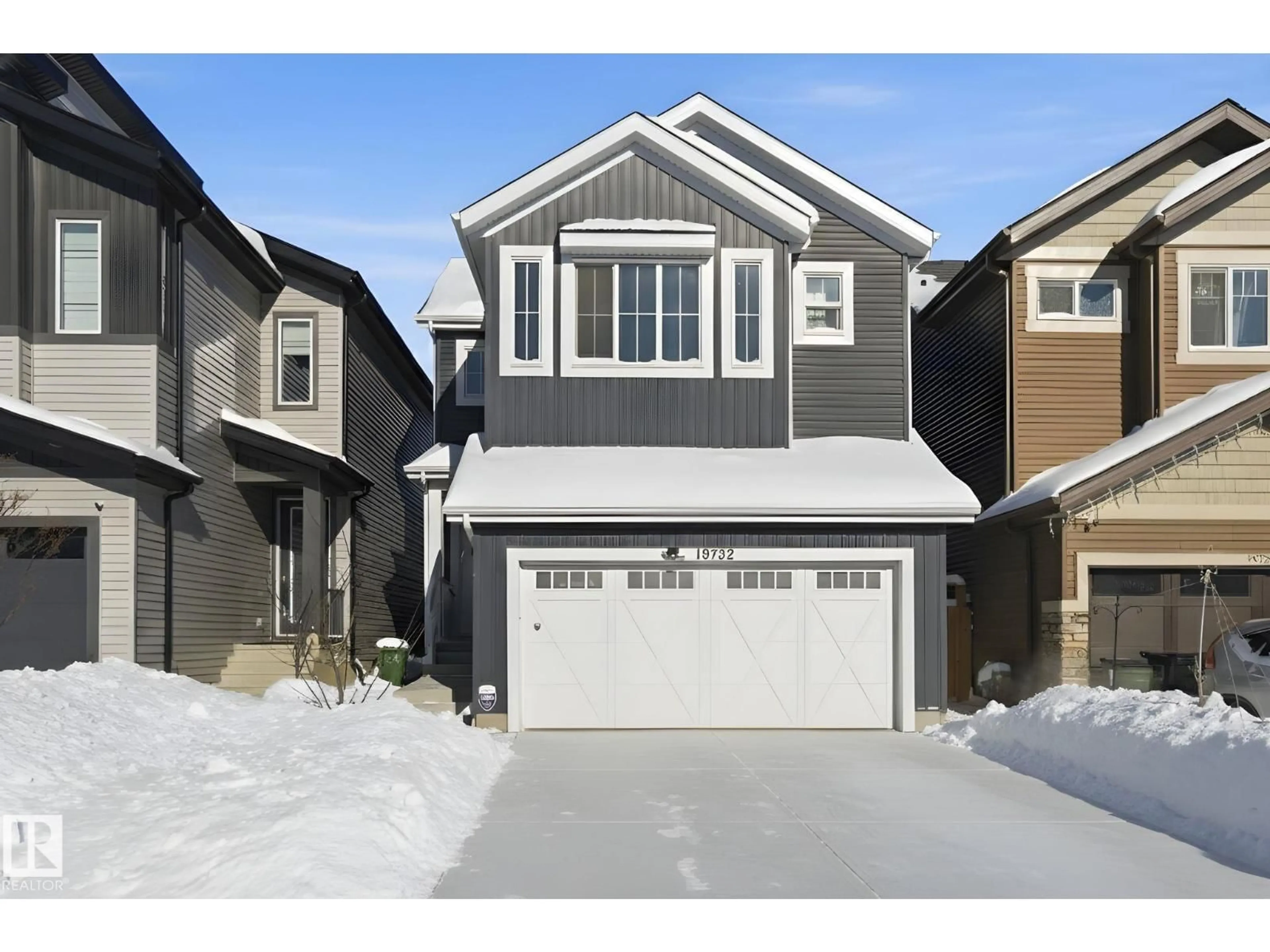 Home with vinyl exterior material, street for NW - 19732 28 AV, Edmonton Alberta T6M1N1