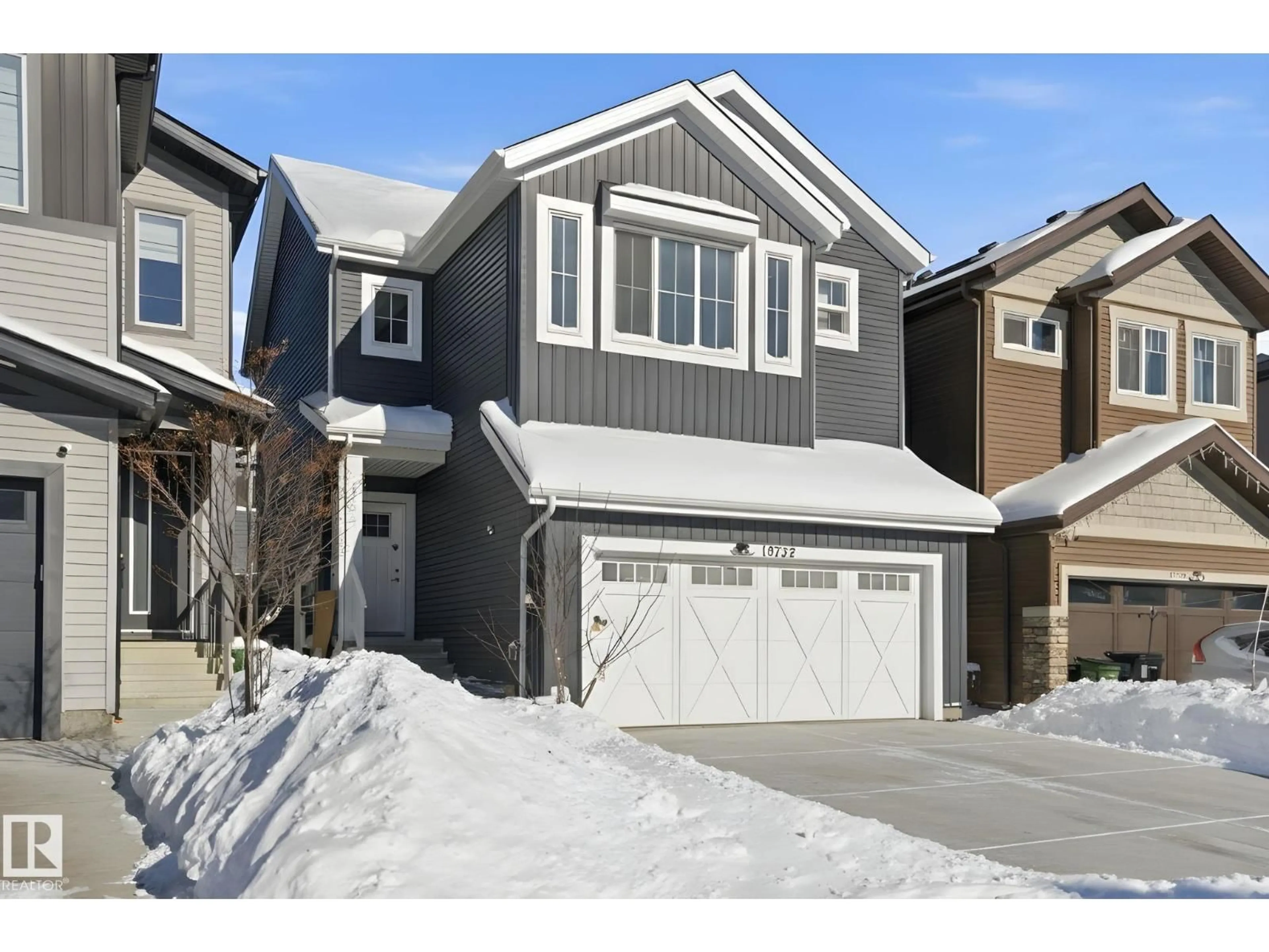 Home with vinyl exterior material, street for NW - 19732 28 AV, Edmonton Alberta T6M1N1