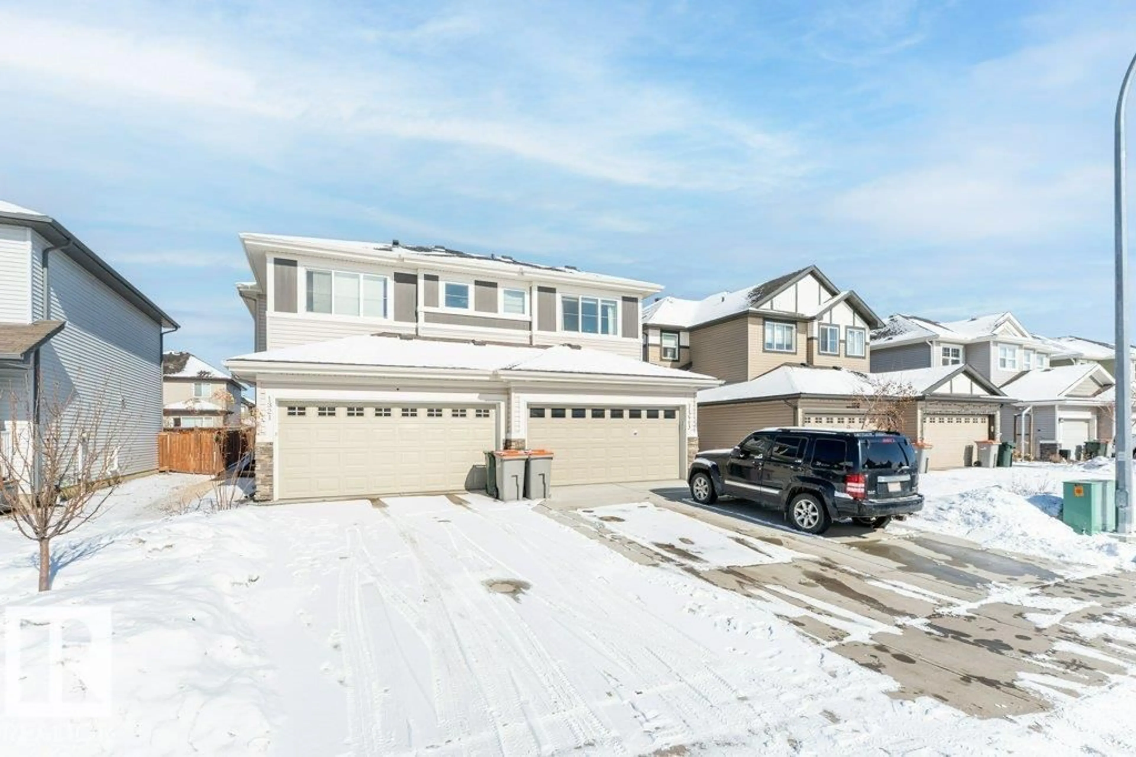 A pic from outside/outdoor area/front of a property/back of a property/a pic from drone, street for 1323 SOUTH CREEK LI, Stony Plain Alberta T7Z0K6
