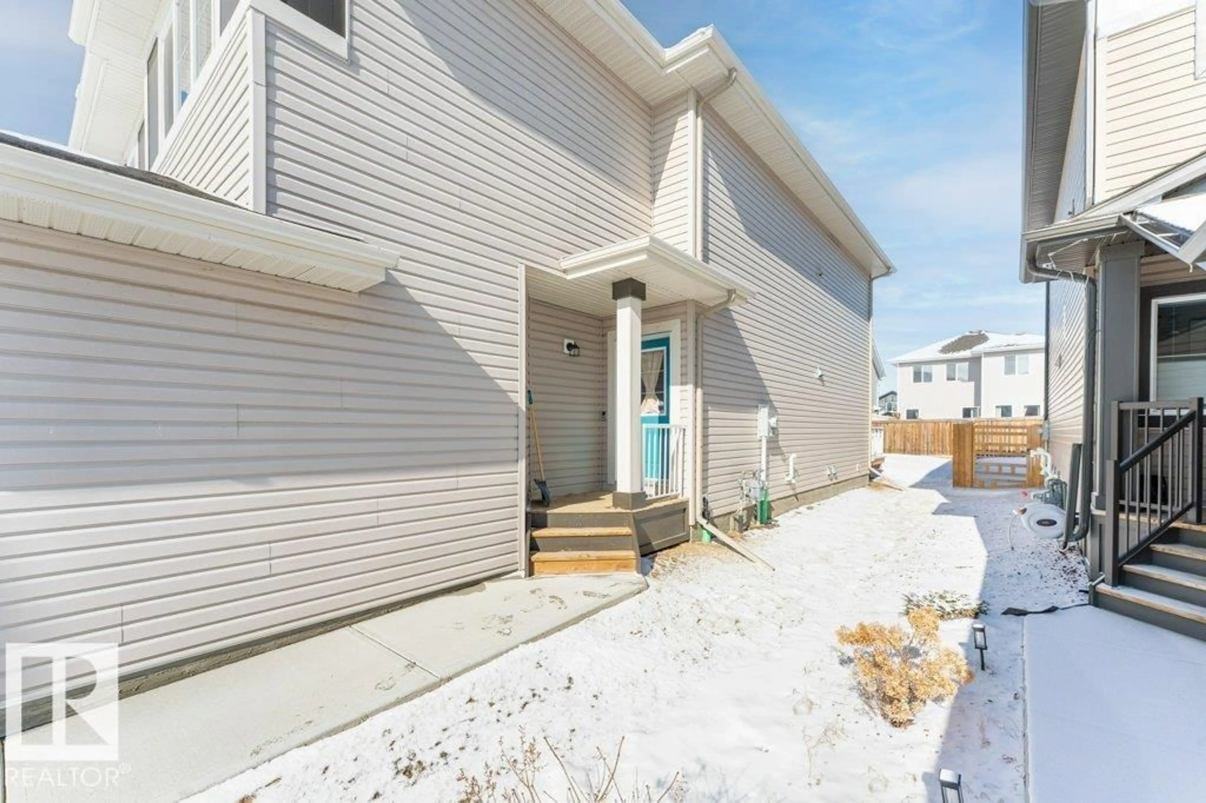 Home with vinyl exterior material, street for 1323 SOUTH CREEK LI, Stony Plain Alberta T7Z0K6