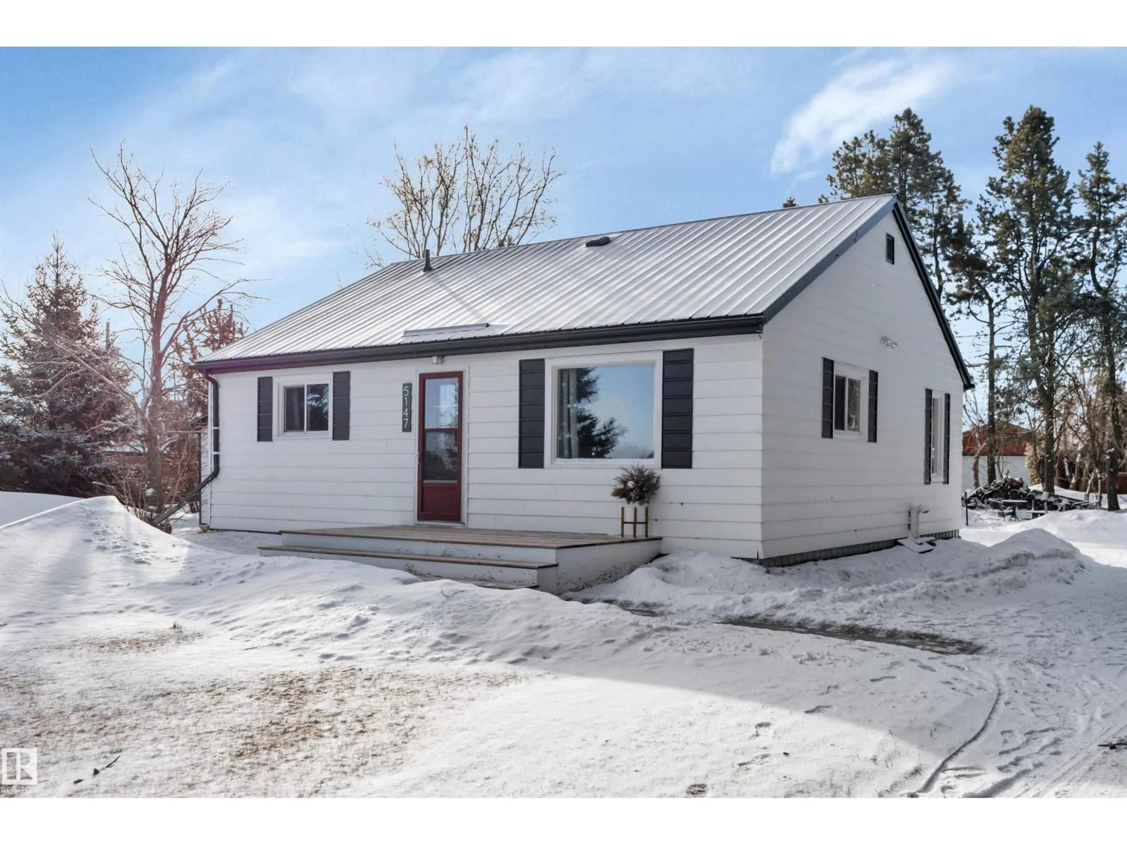 Home with vinyl exterior material, street for 5147 53 AV, Millet Alberta T0C1Z0