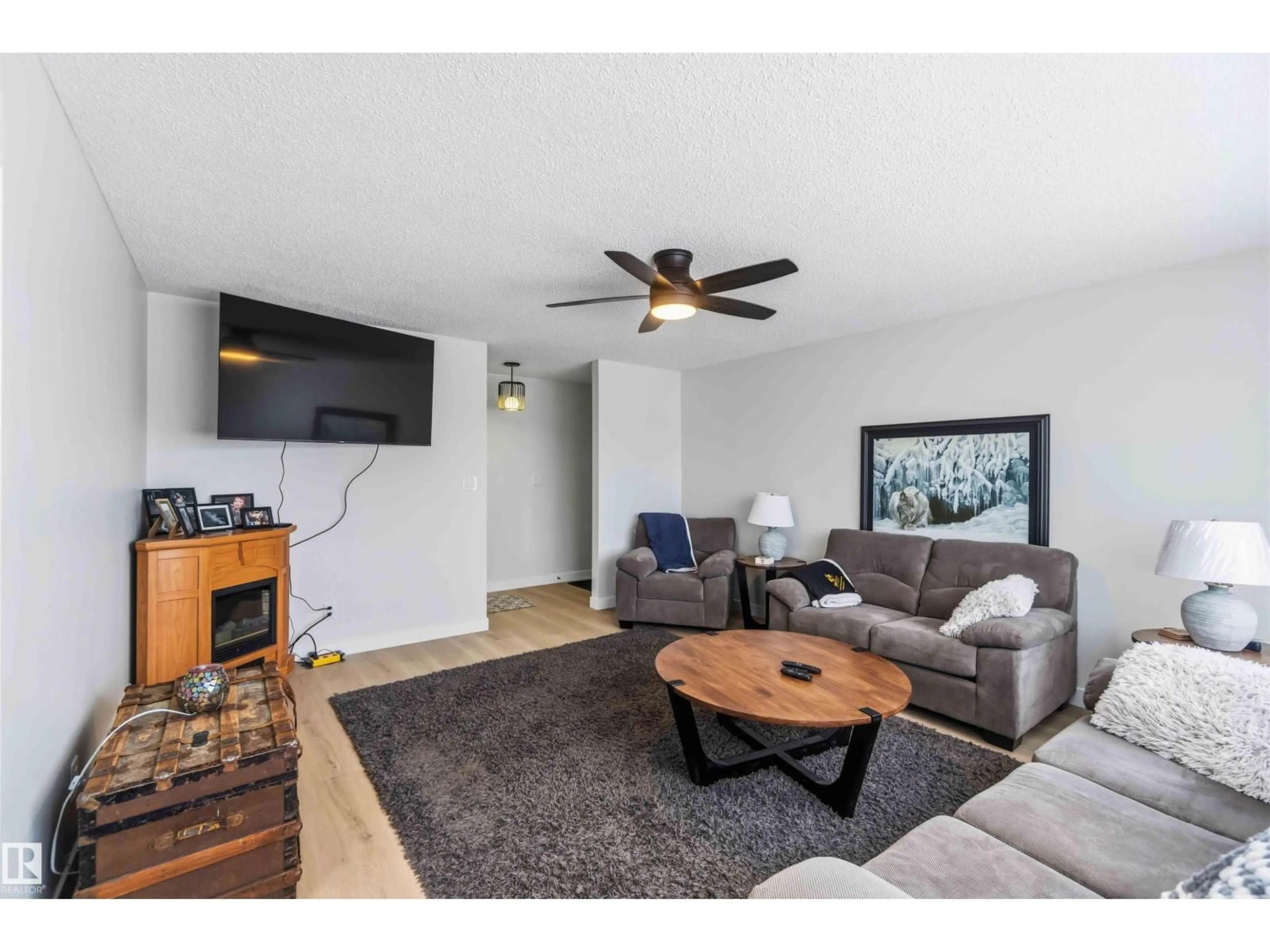 Living room with furniture, wood/laminate floor for 4615 49 AV, Redwater Alberta T0A2W0