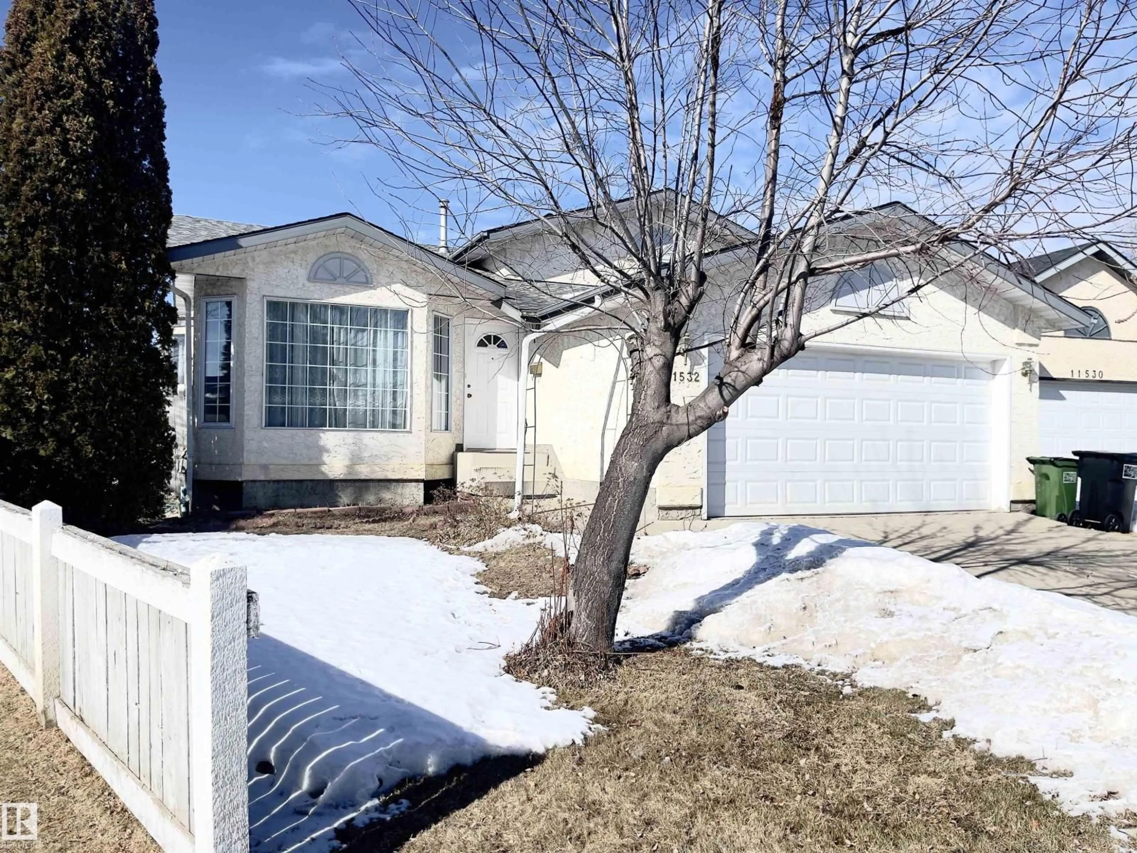 Home with vinyl exterior material, street for 11532 9 AV, Edmonton Alberta T6J6T9