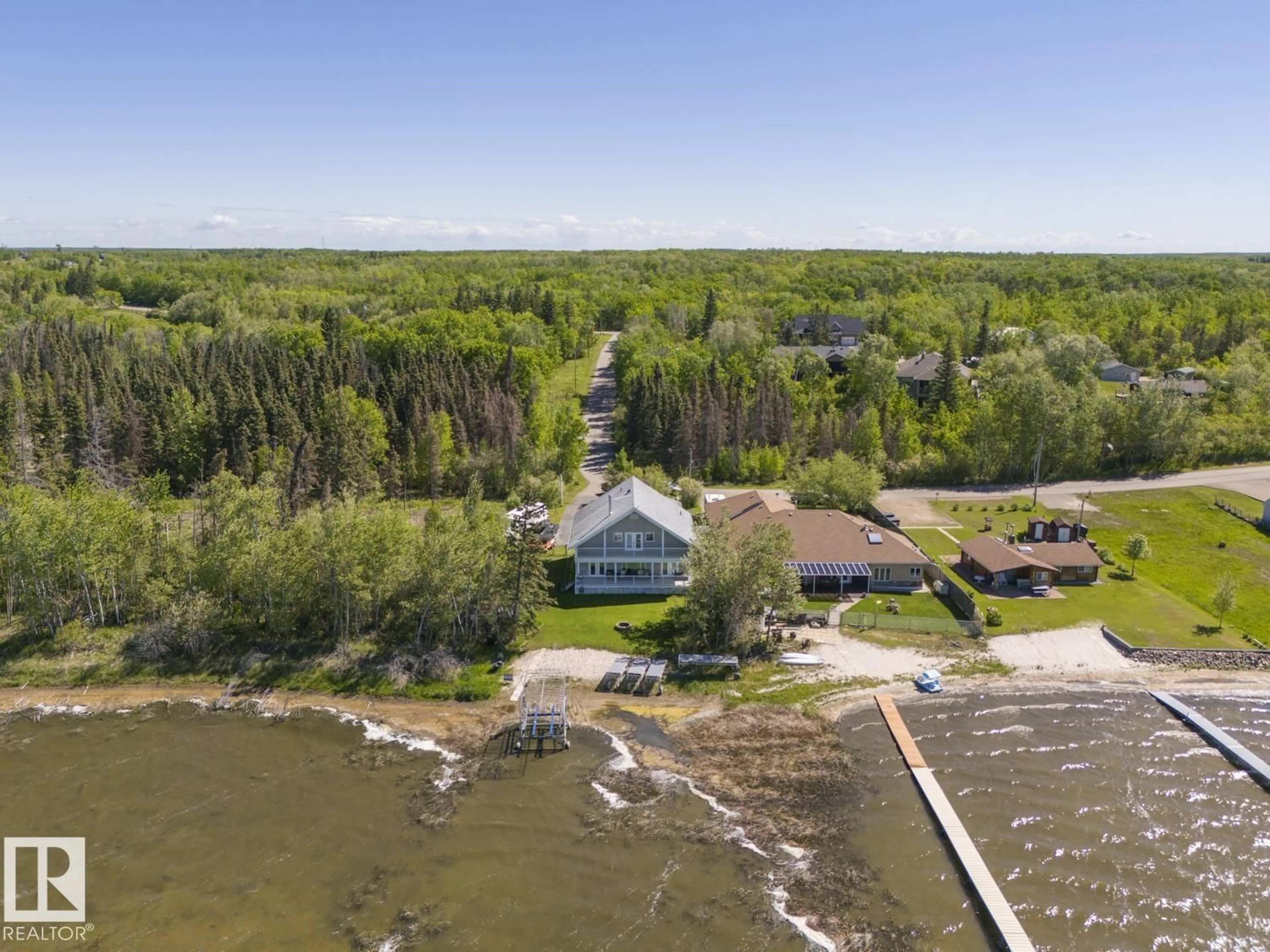 A pic from outside/outdoor area/front of a property/back of a property/a pic from drone, water/lake/river/ocean view for 47 GROSBEAK CR, Rural Bonnyville M.D. Alberta T9N2J6