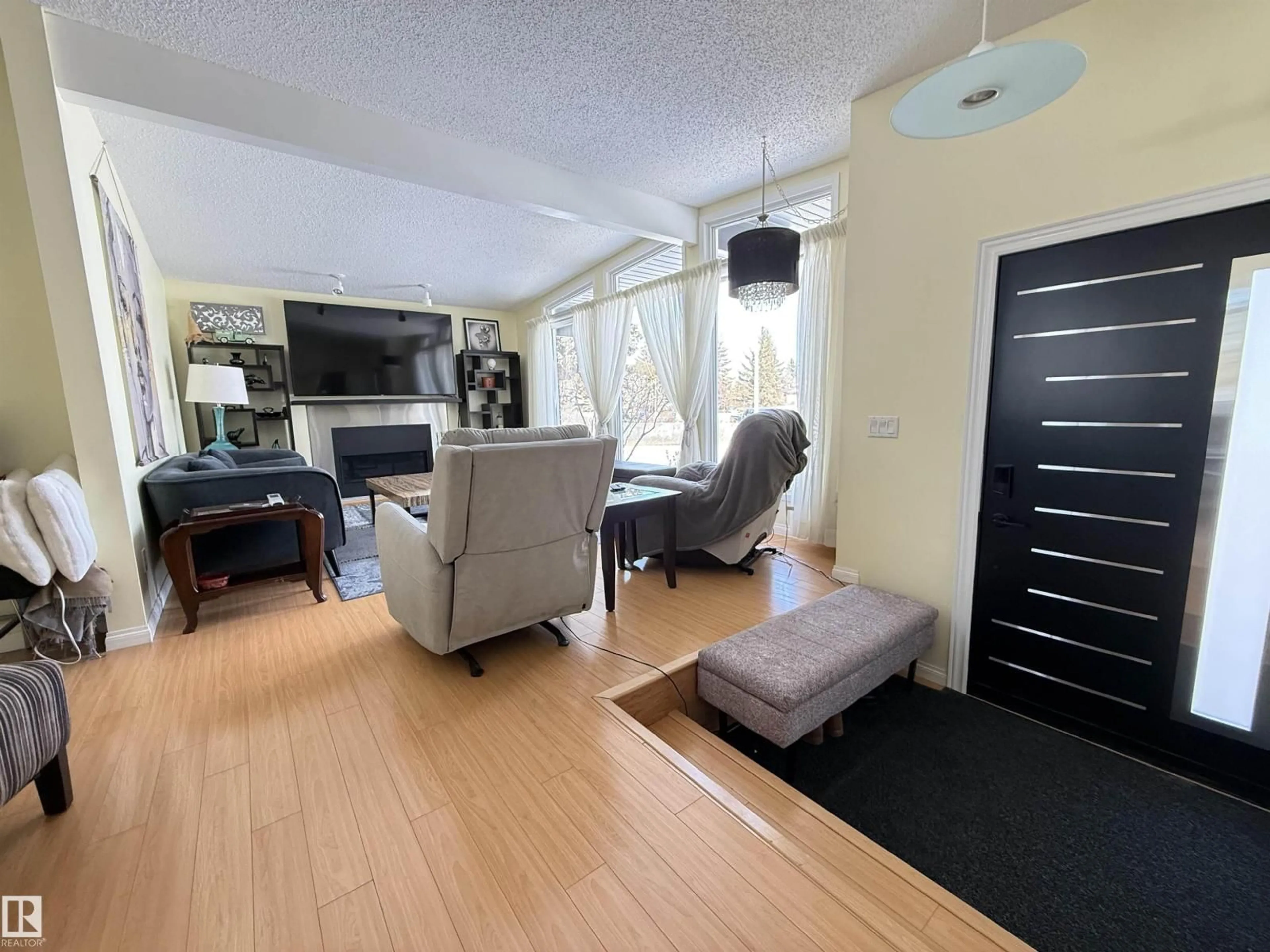 Living room with furniture, unknown for 9515 149 AV, Edmonton Alberta T5E2M3