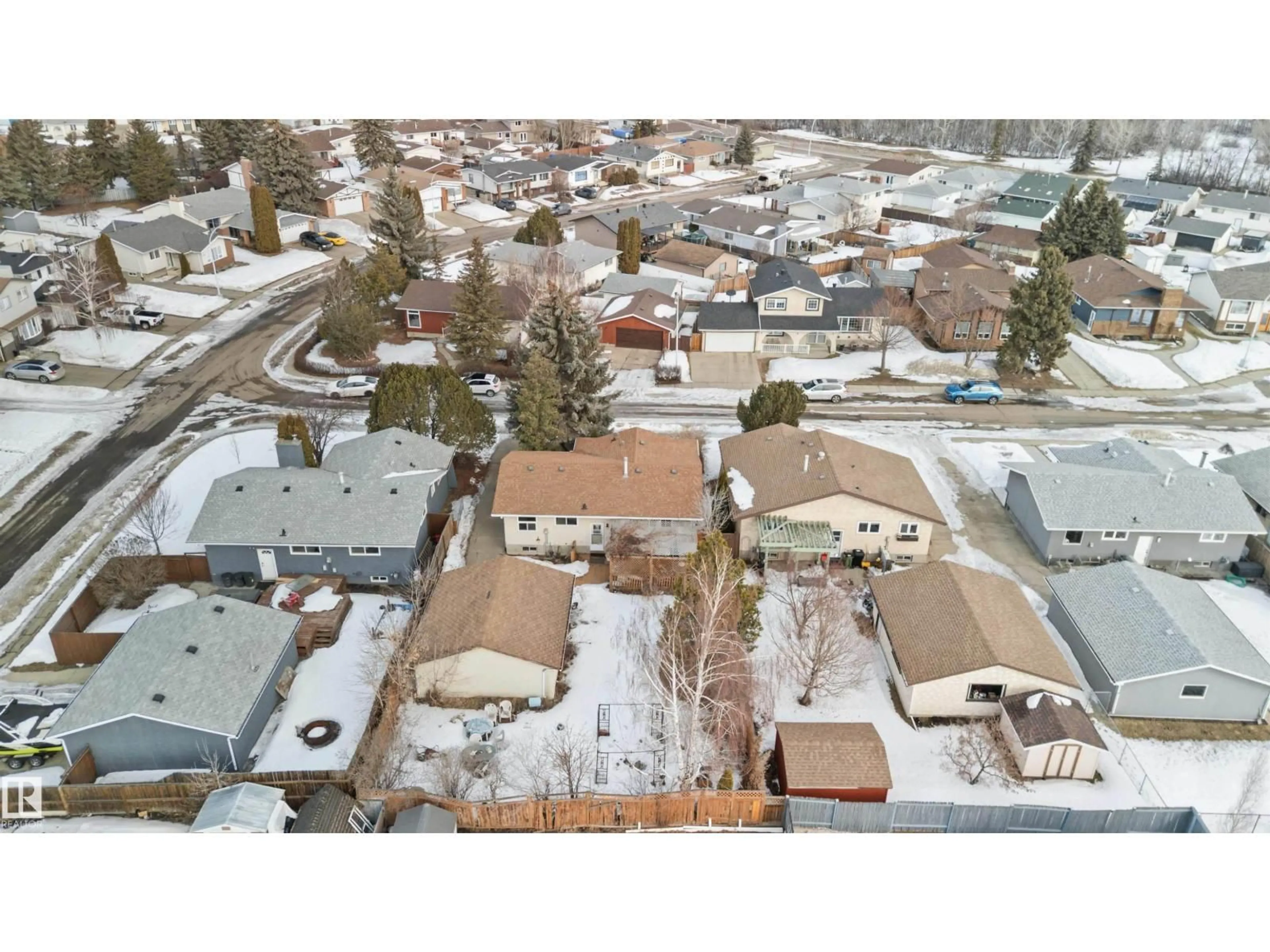 A pic from outside/outdoor area/front of a property/back of a property/a pic from drone, street for 12223 157 AV, Edmonton Alberta T5X2X7