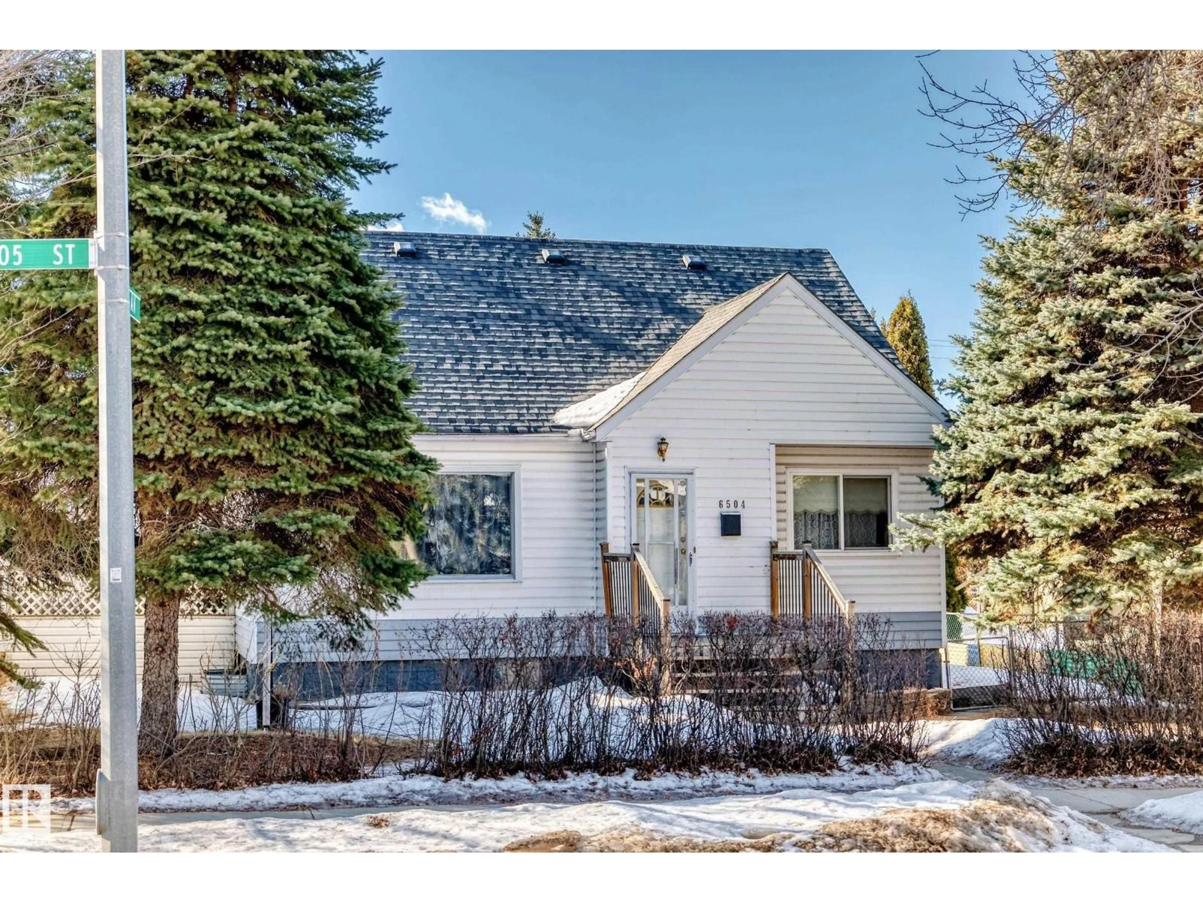 Home with vinyl exterior material, street for 6504 105 ST, Edmonton Alberta T6H1V3