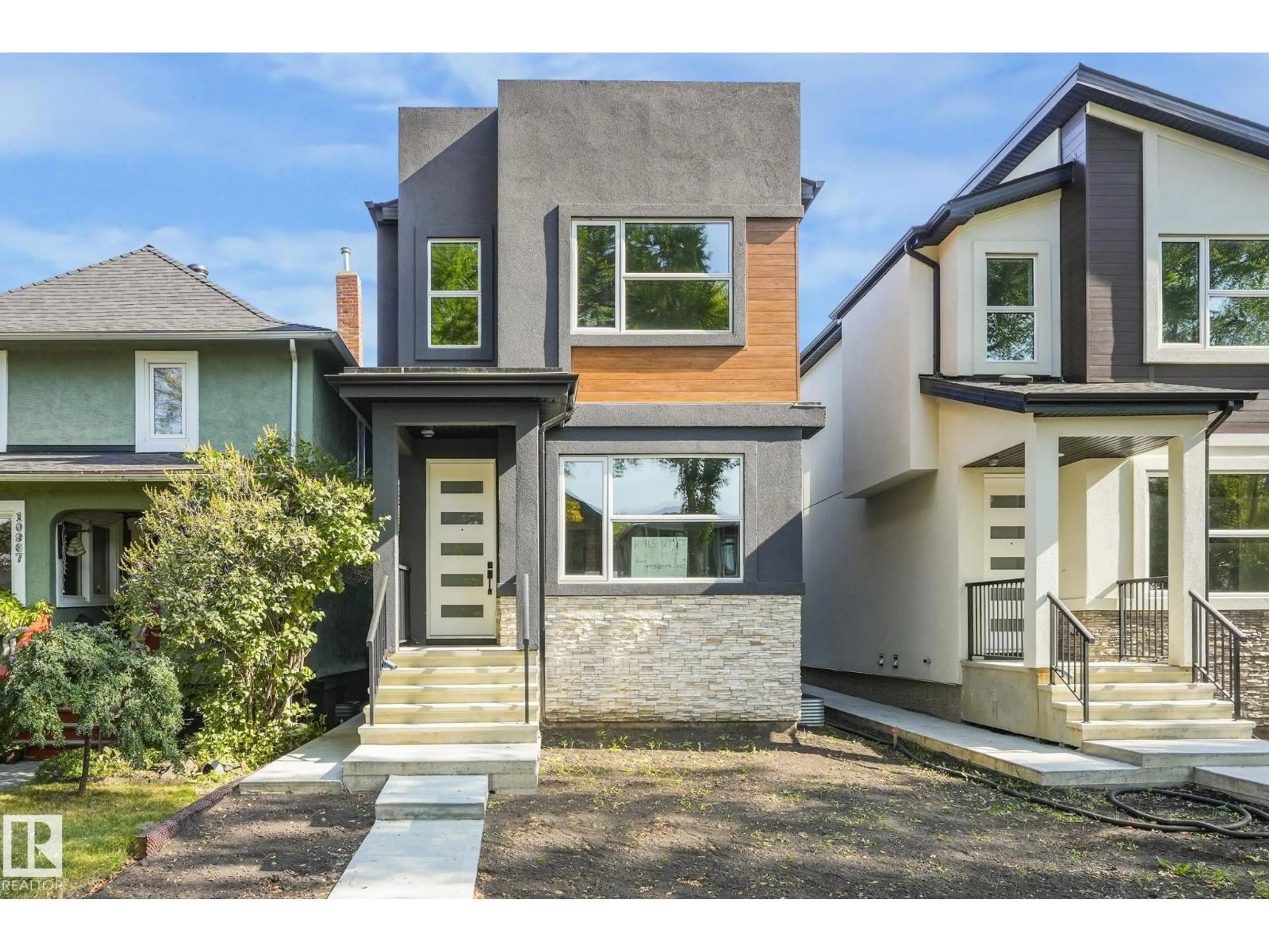 Home with brick exterior material, street for 10965 129 ST, Edmonton Alberta T5M0Y2