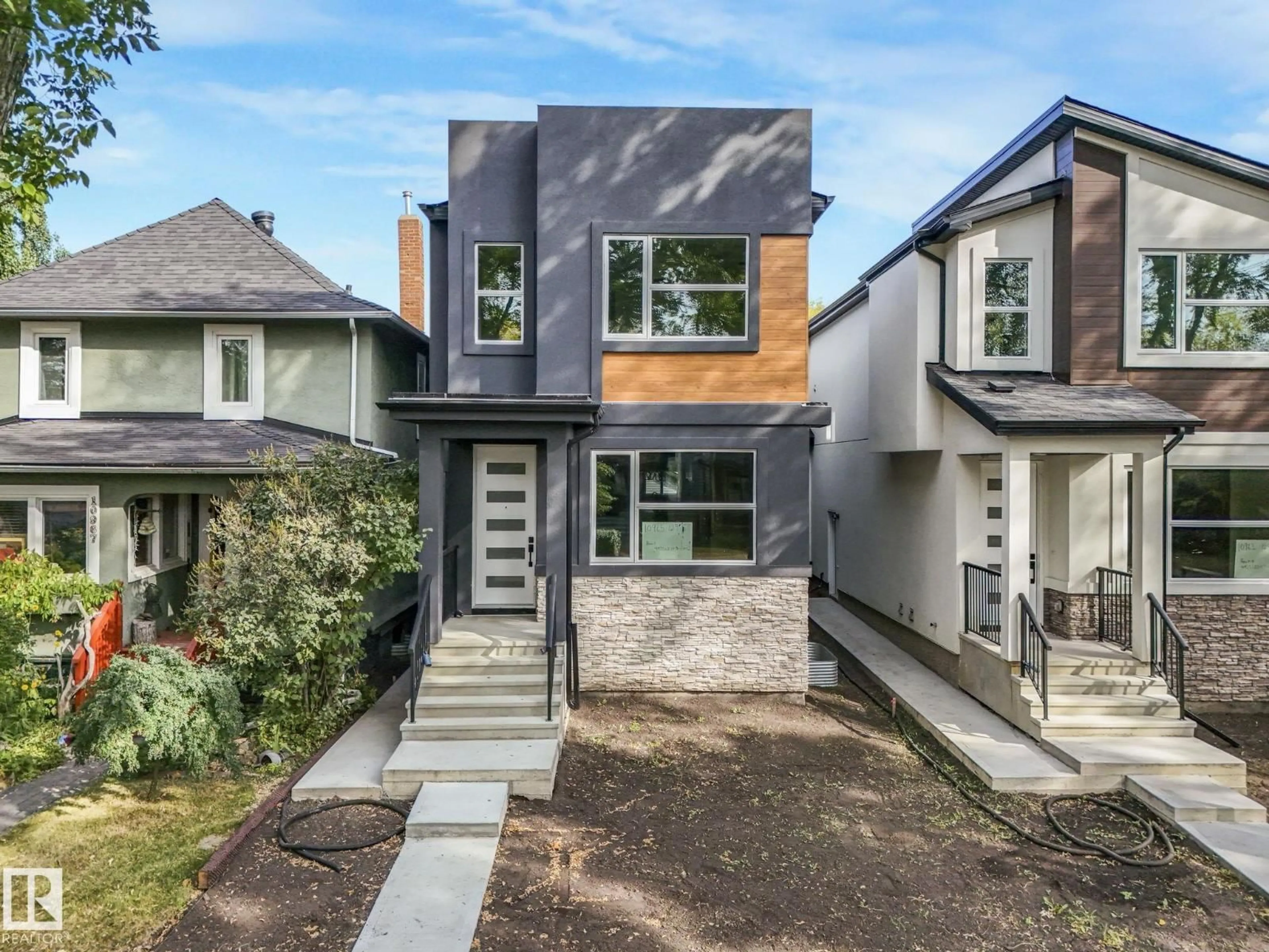 Home with brick exterior material, street for 10965 129 ST, Edmonton Alberta T5M0Y2