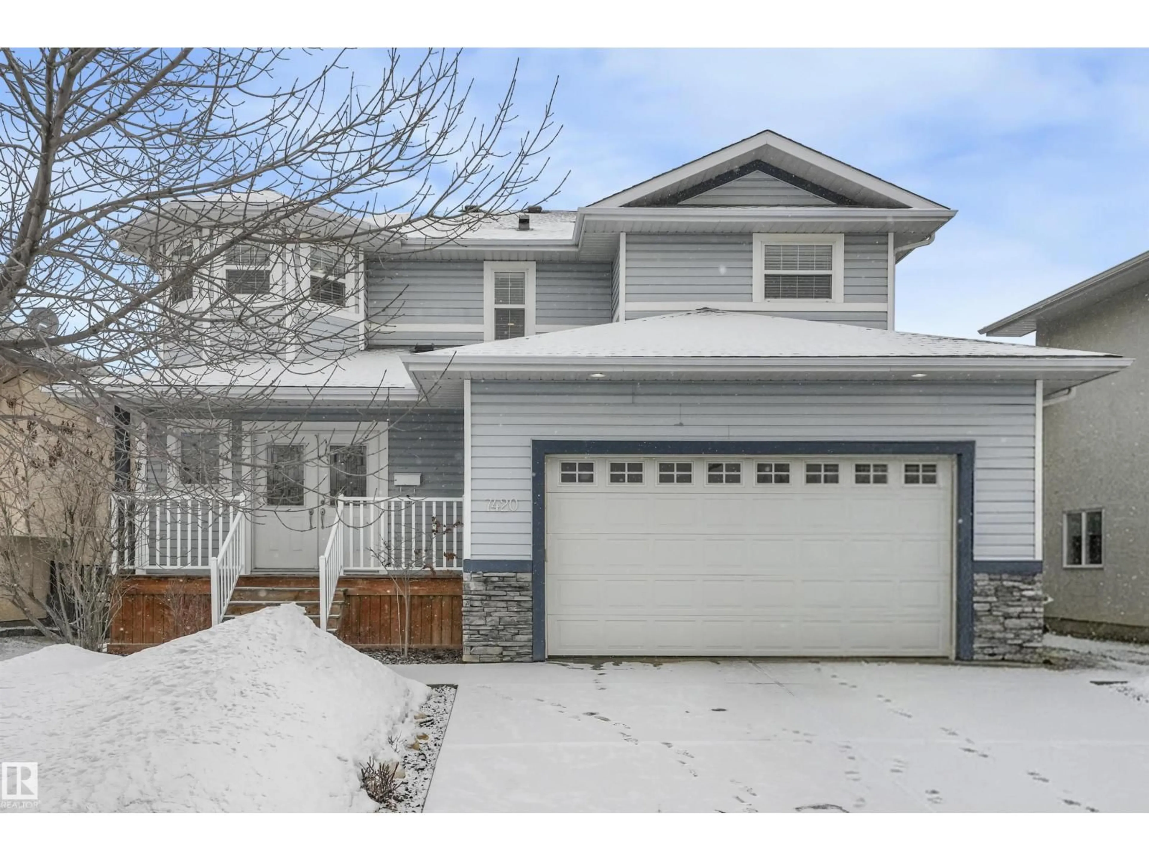 Home with vinyl exterior material, street for NW - 7420 161A AV, Edmonton Alberta T5Z3T1