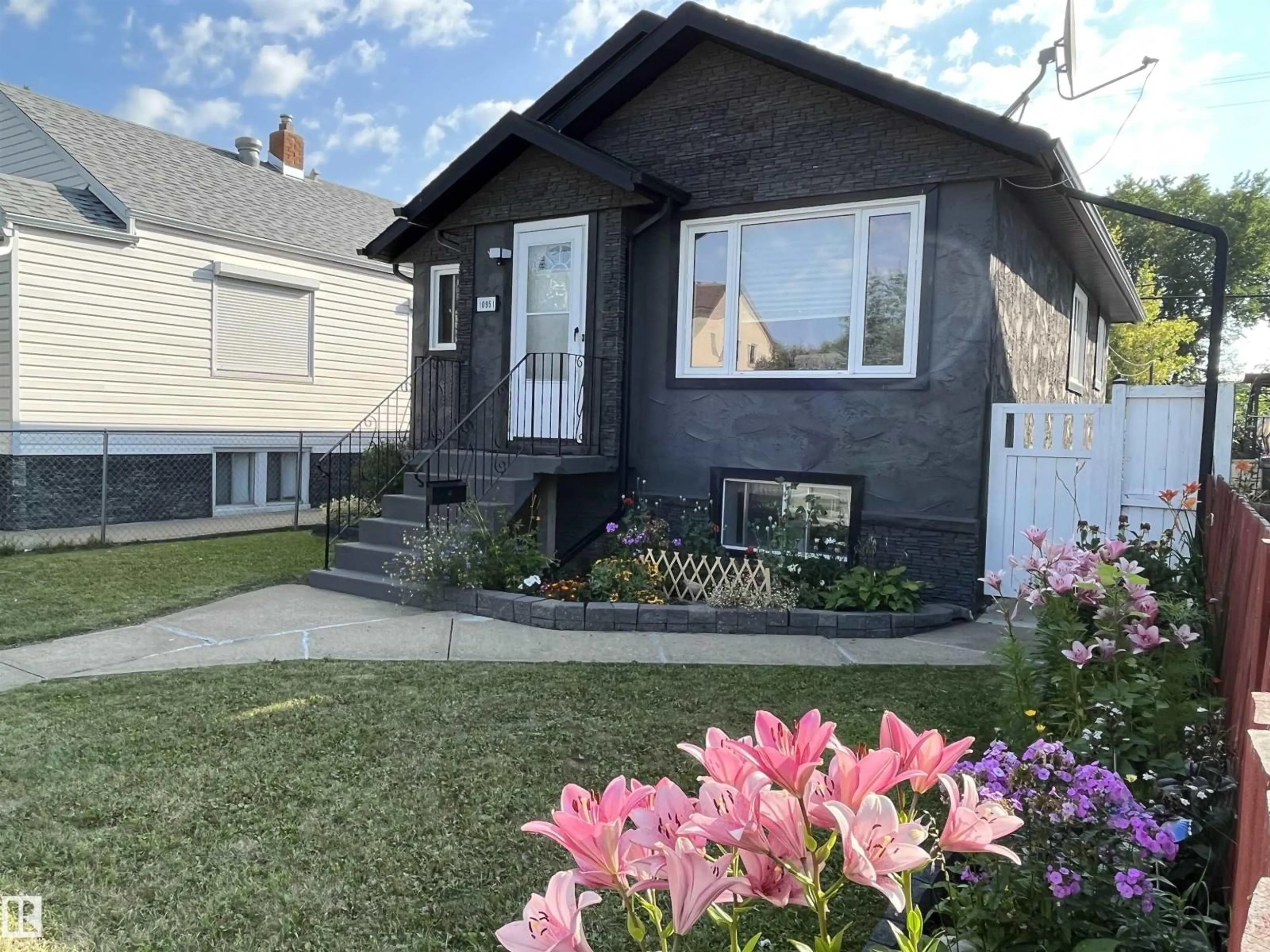 Home with vinyl exterior material, street for NW - 10951 96 ST, Edmonton Alberta T5H2K6