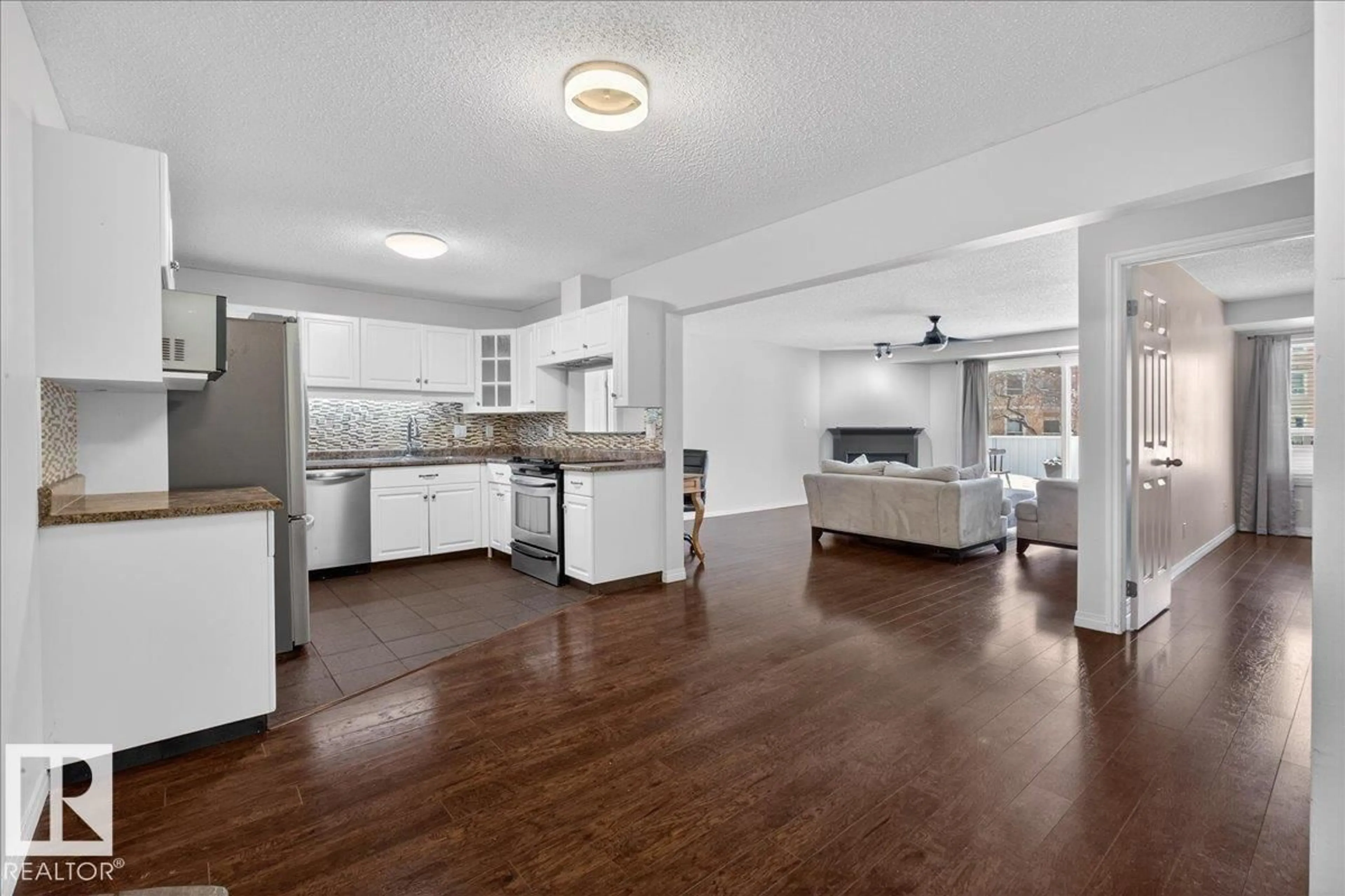 Open concept kitchen, unknown for #101 - 8811 106A AV NW, Edmonton Alberta T5H3Y7